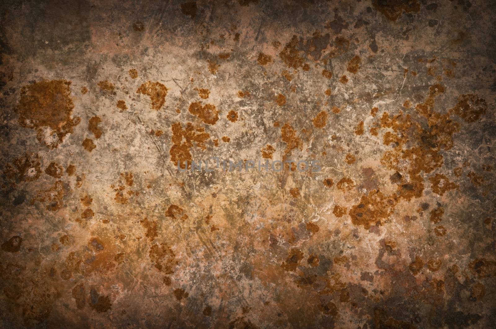 Metallic background with rusty corrosion, darkened around the edges