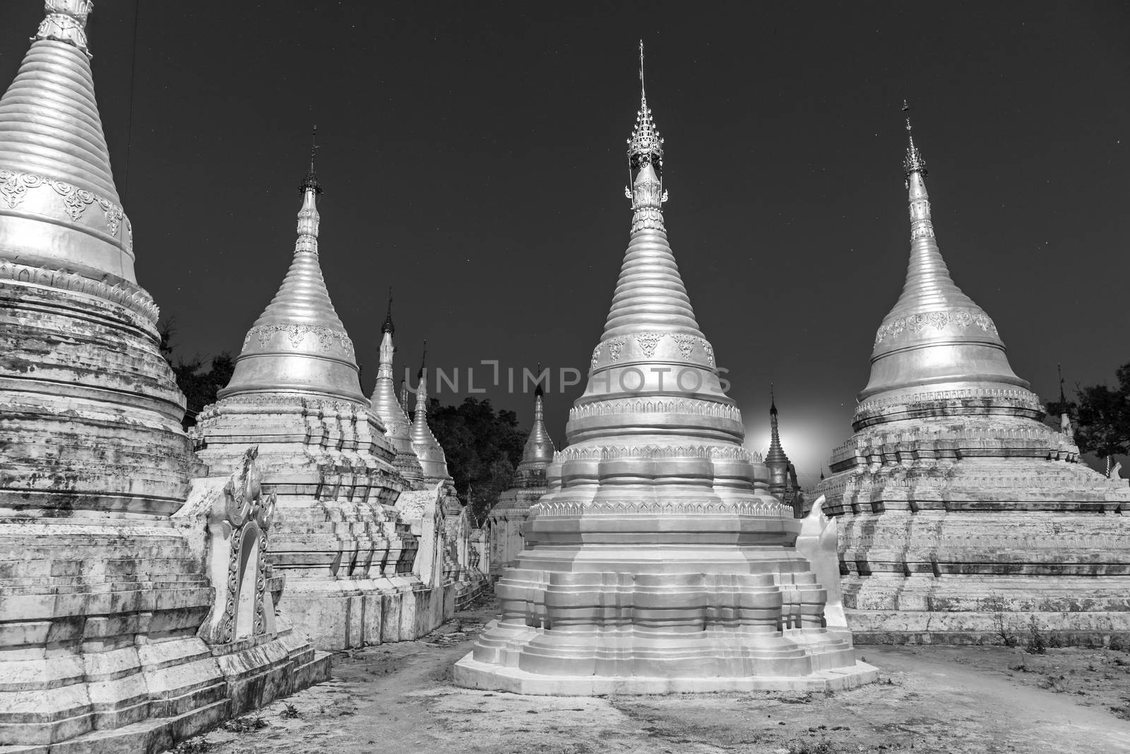 Ancient temple close to Pindaya Cave located next to the town of Pindaya, Shan State, Burma, Myanmar,  Famous buddhist pilgrimage site and a tourist attraction. Black and white image.