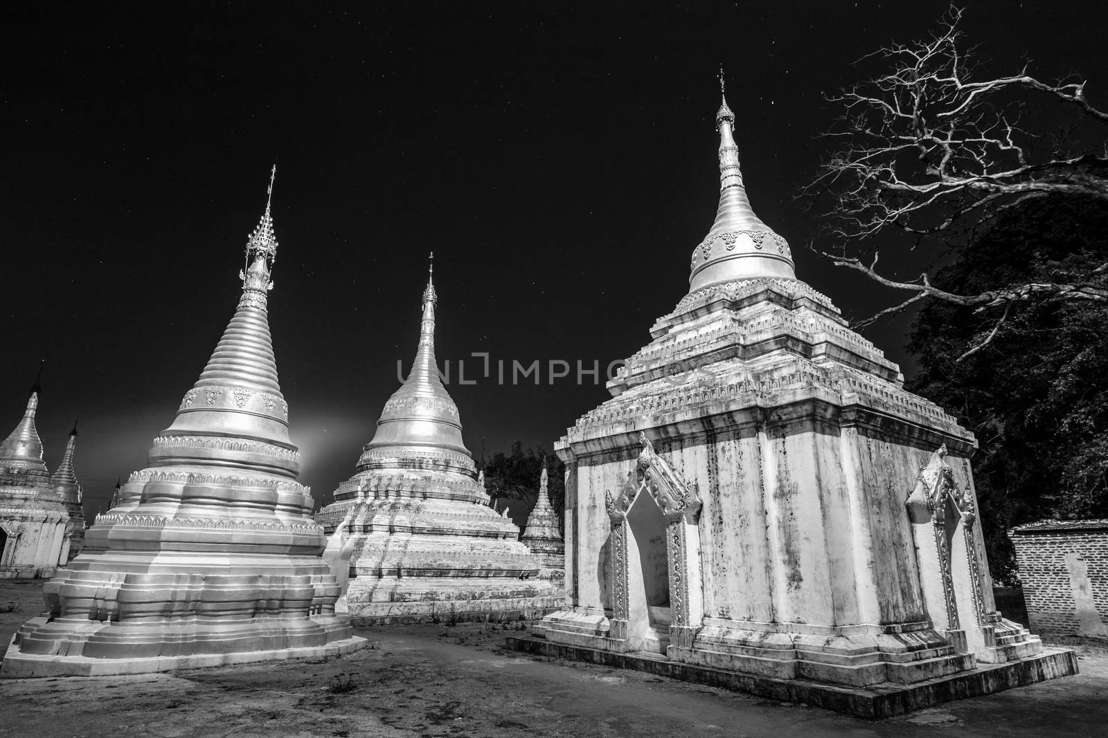 Ancient temple close to Pindaya Cave located next to the town of Pindaya, Shan State, Burma, Myanmar,  Famous buddhist pilgrimage site and a tourist attraction. Black and white image.