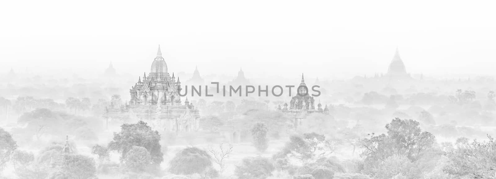 Temples of Bagan an ancient city located in the Mandalay Region of Burma, Myanmar, Asia. High key black and white image.