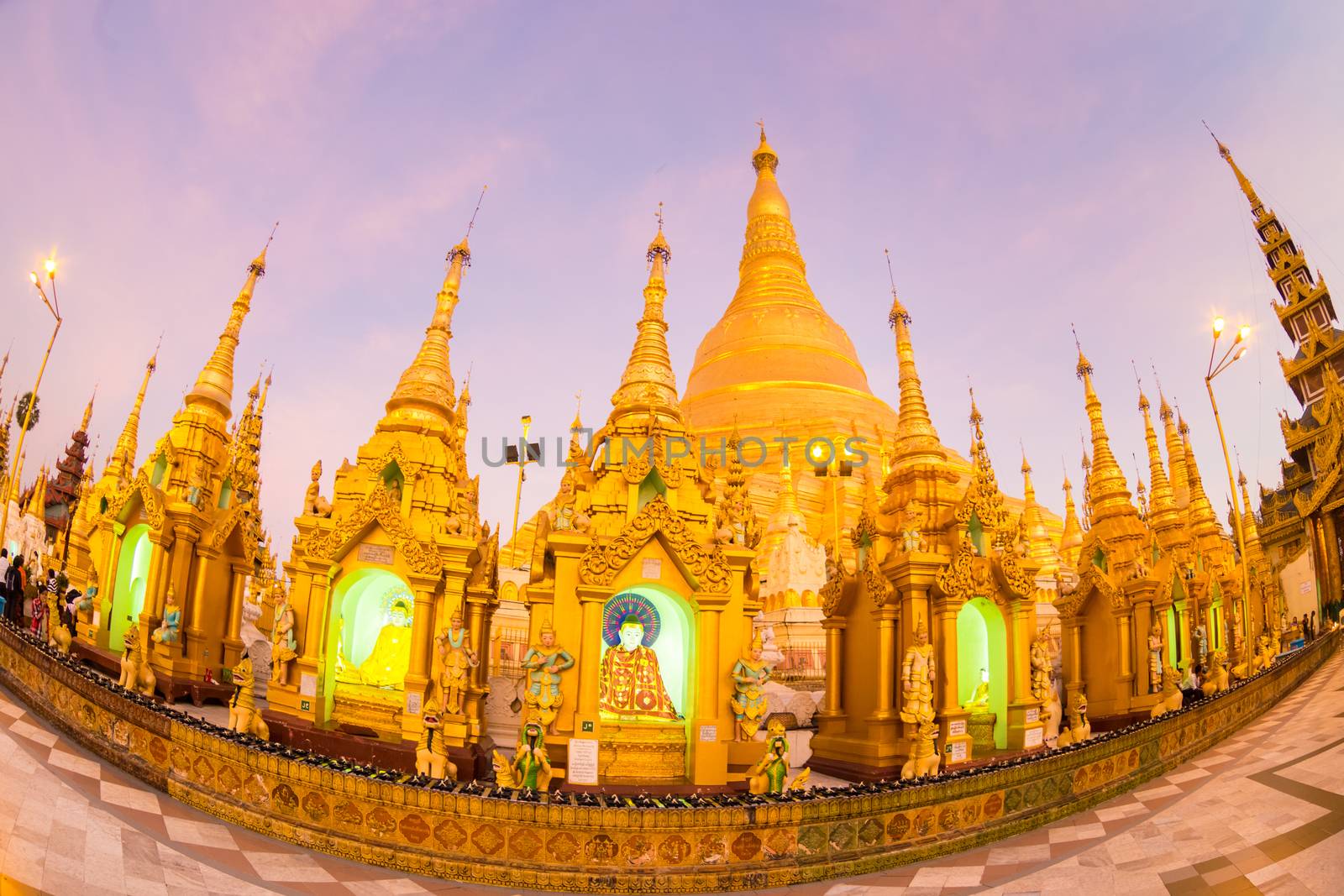 Twilight over Swedagon Paya in Yangon, Myanmar Burma. Fish eye lens shot.