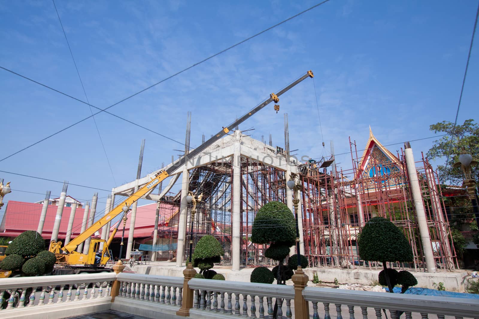 Construction site with crane and building