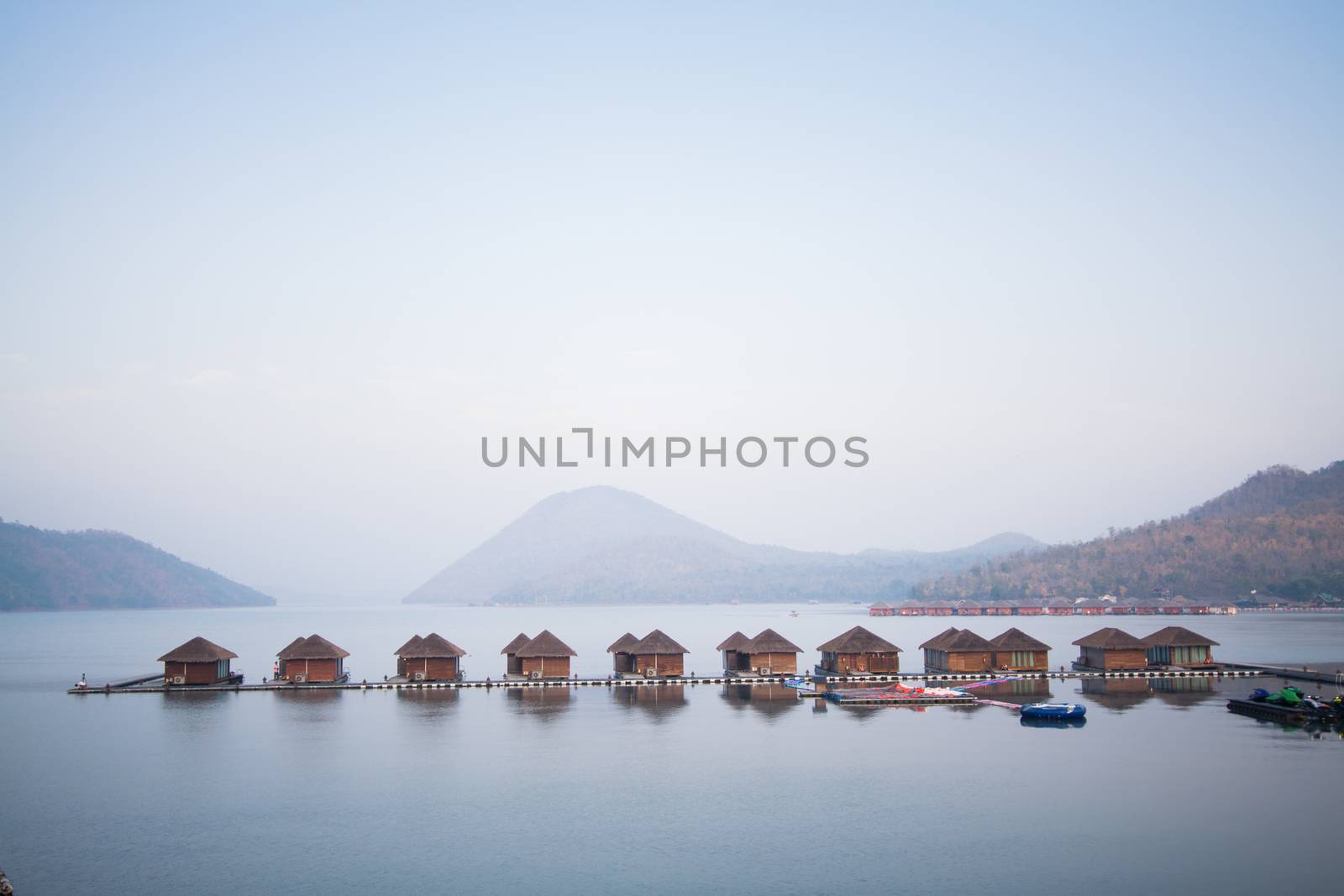  Home on wooden bridge mountain blue sky by kritsada1992