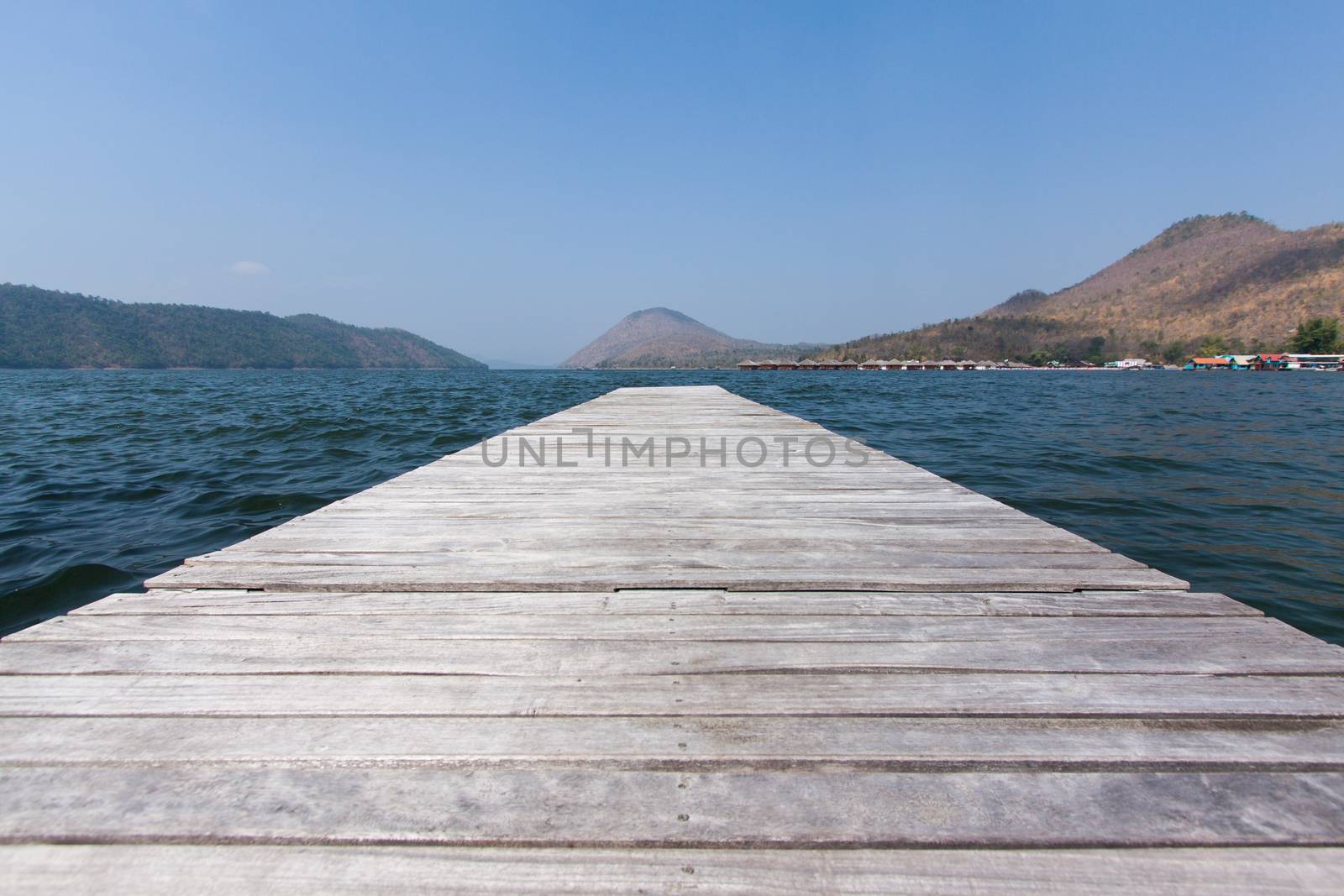 Wooden bridge on the water,Kanchanaburi by kritsada1992