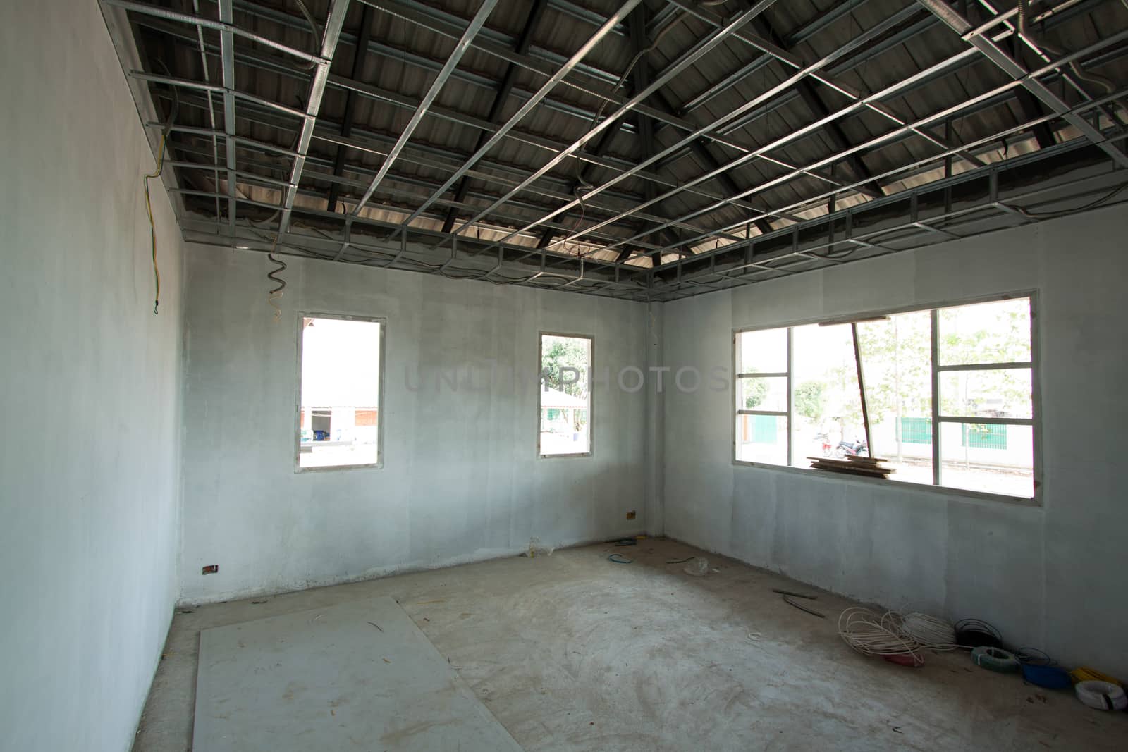 Interior view of a new home under construction by kritsada1992