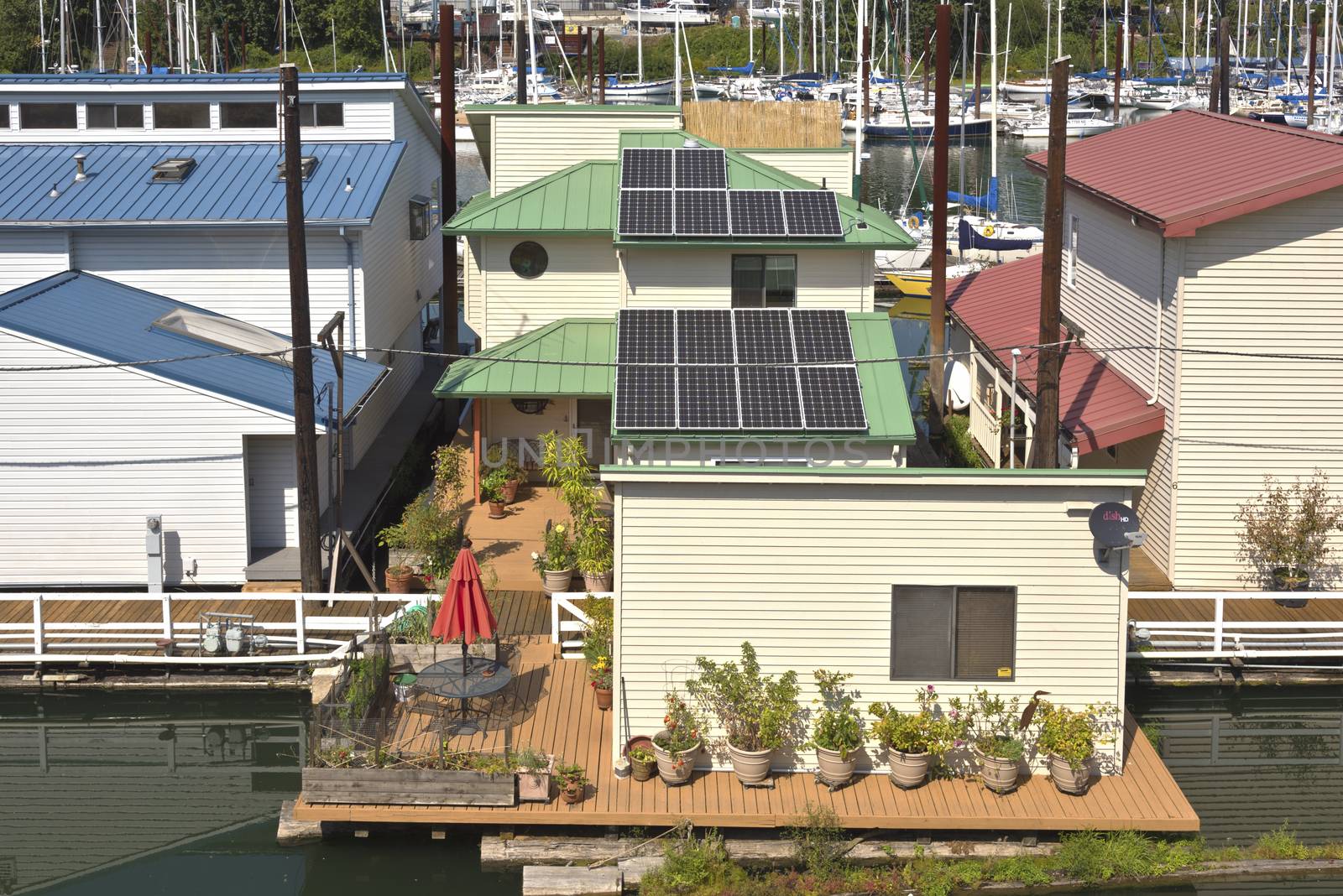 Solar panels on rooftops on a floating house Portland Oregon.