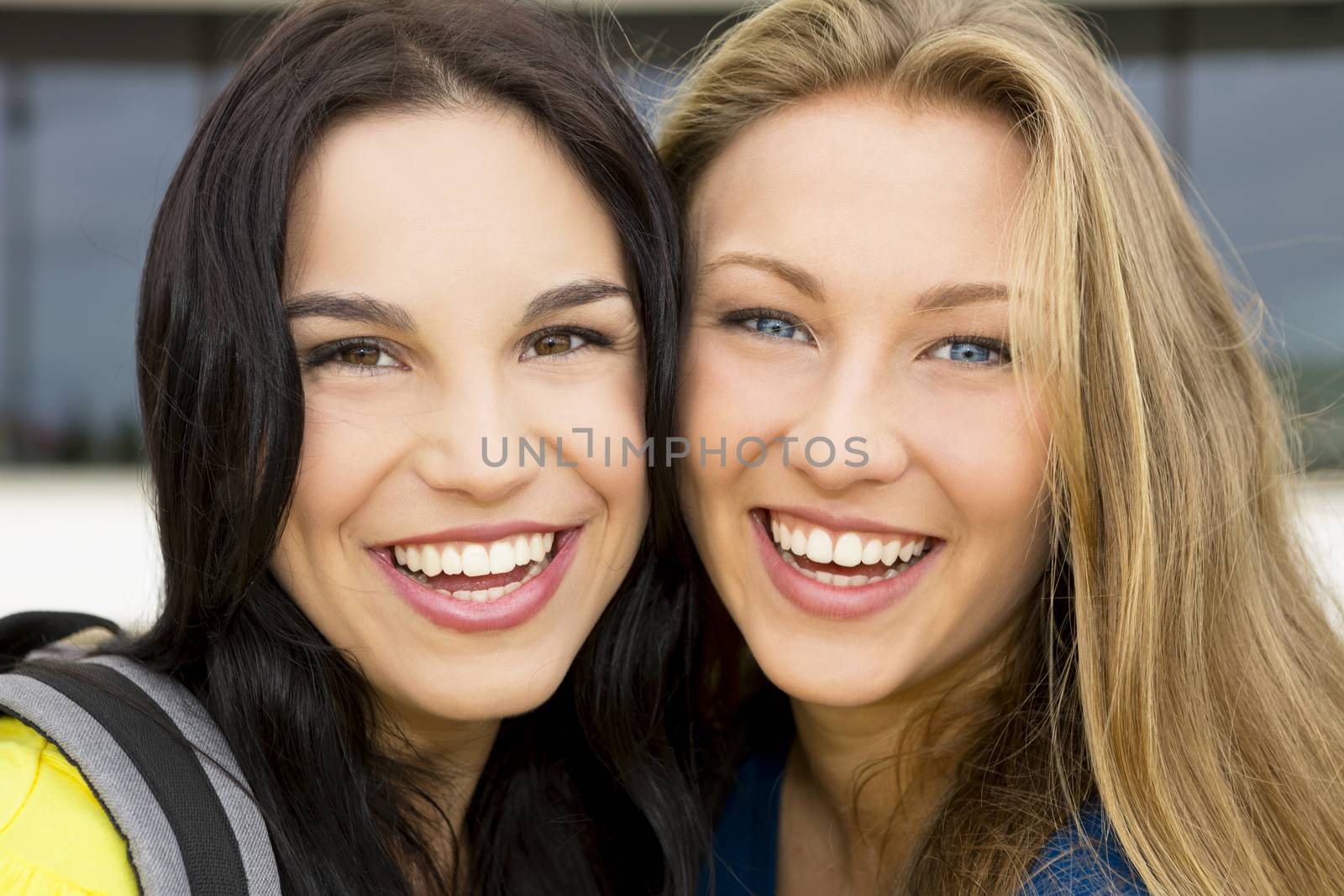 Portrait of a beautiful two young girls smiling