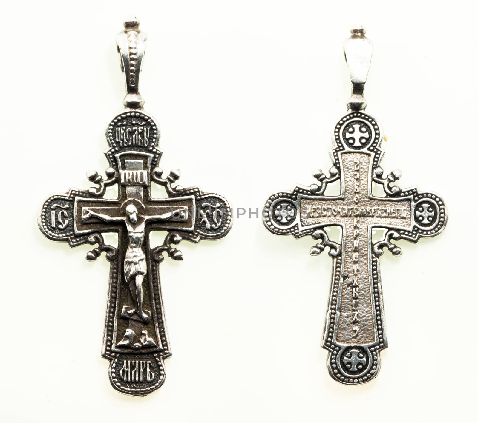 Orthodox neck a silver cross, isolated on white