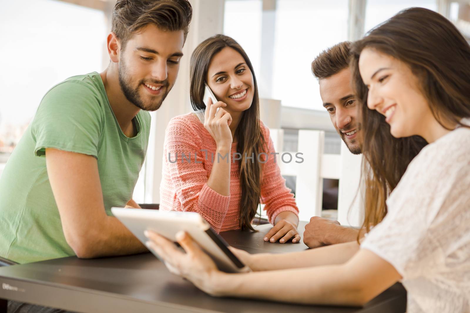 Group of friends meeting In the local Coffee Shop