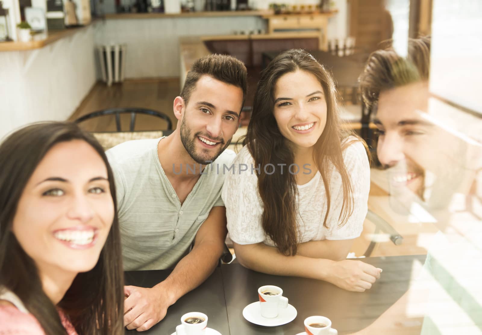 Friends having a great day at the local coffee shop