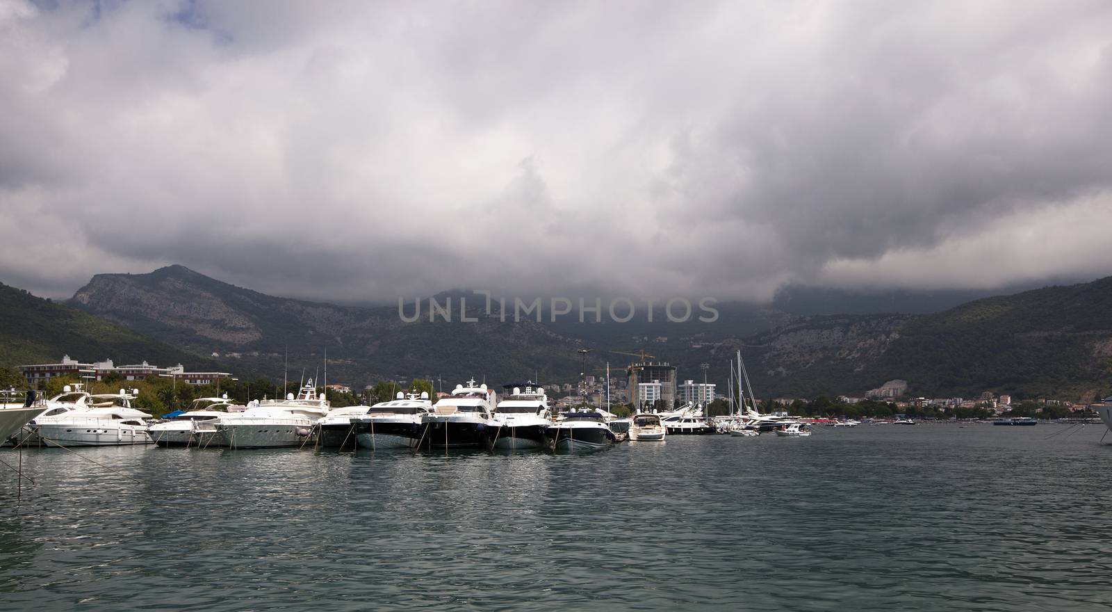  boats on pier on the sea. Montenegro. summer.