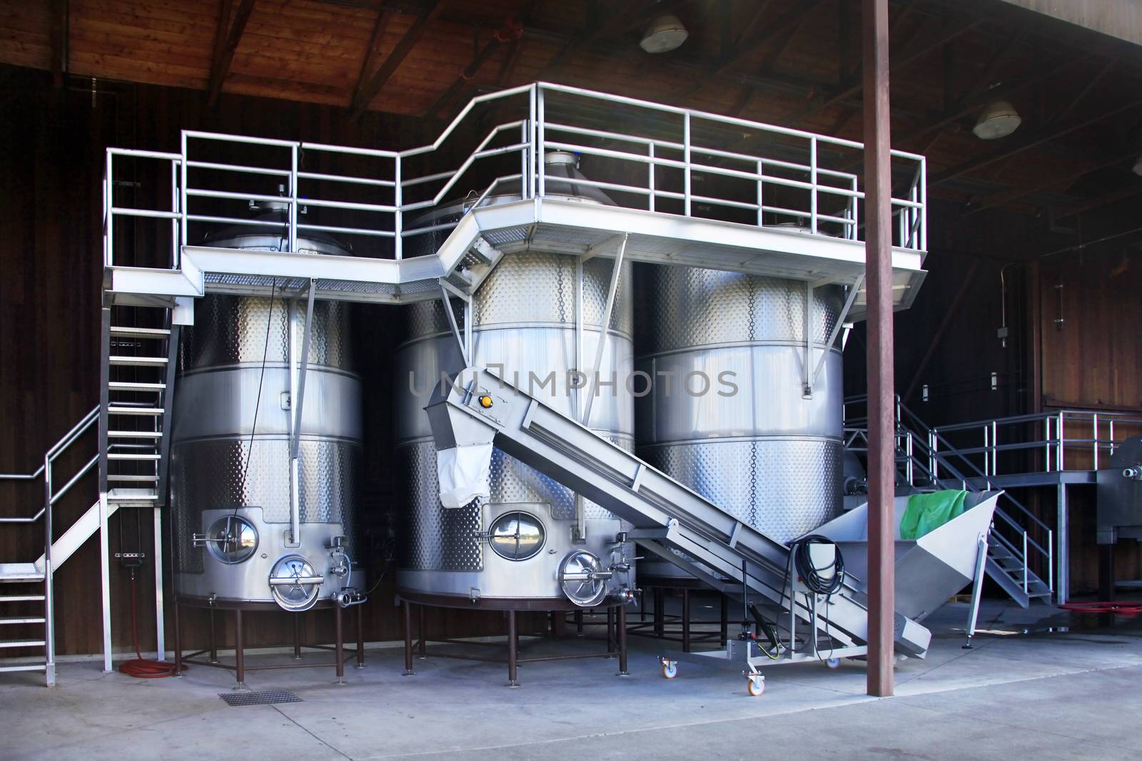 Modern aluminum barrels where grape juice is aged into wine