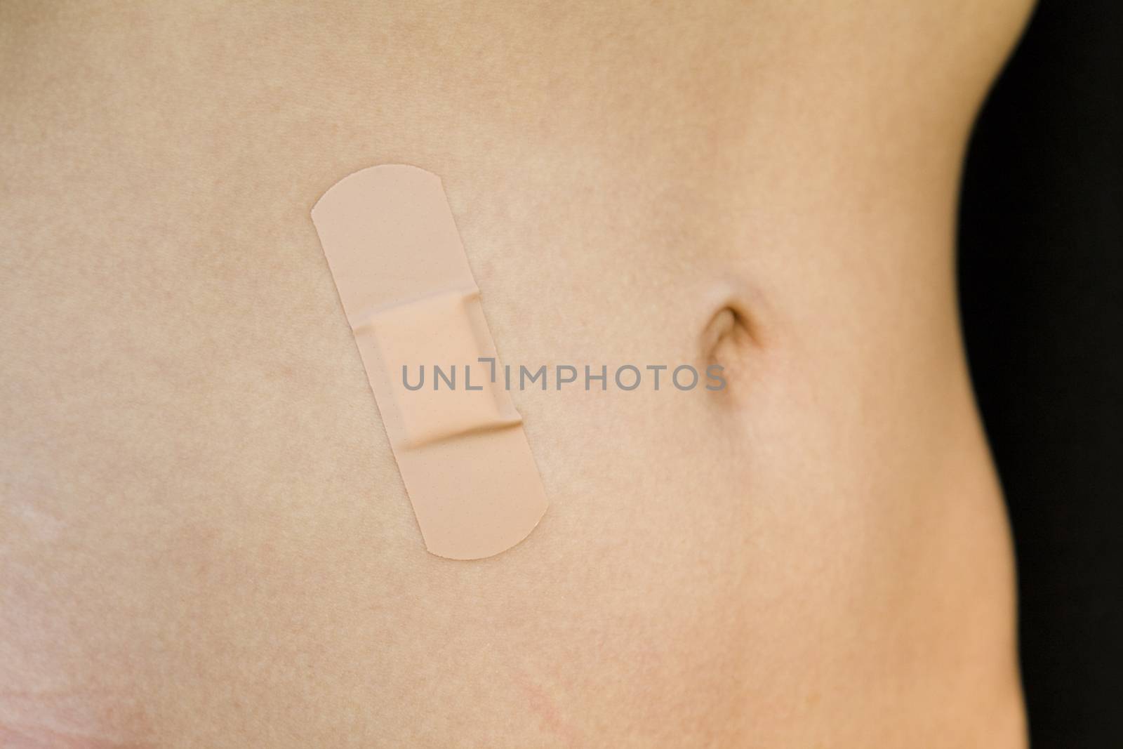 band-aid, pasted on the belly girls