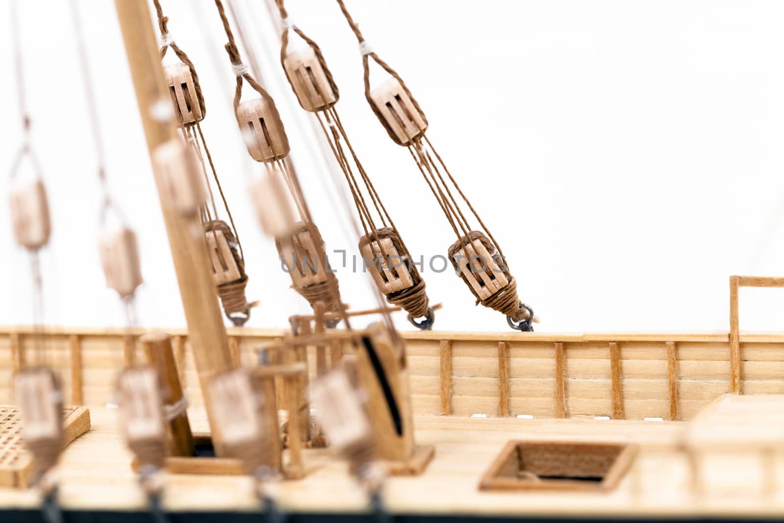  the part of model of the ship made of a tree. photographed by a close up