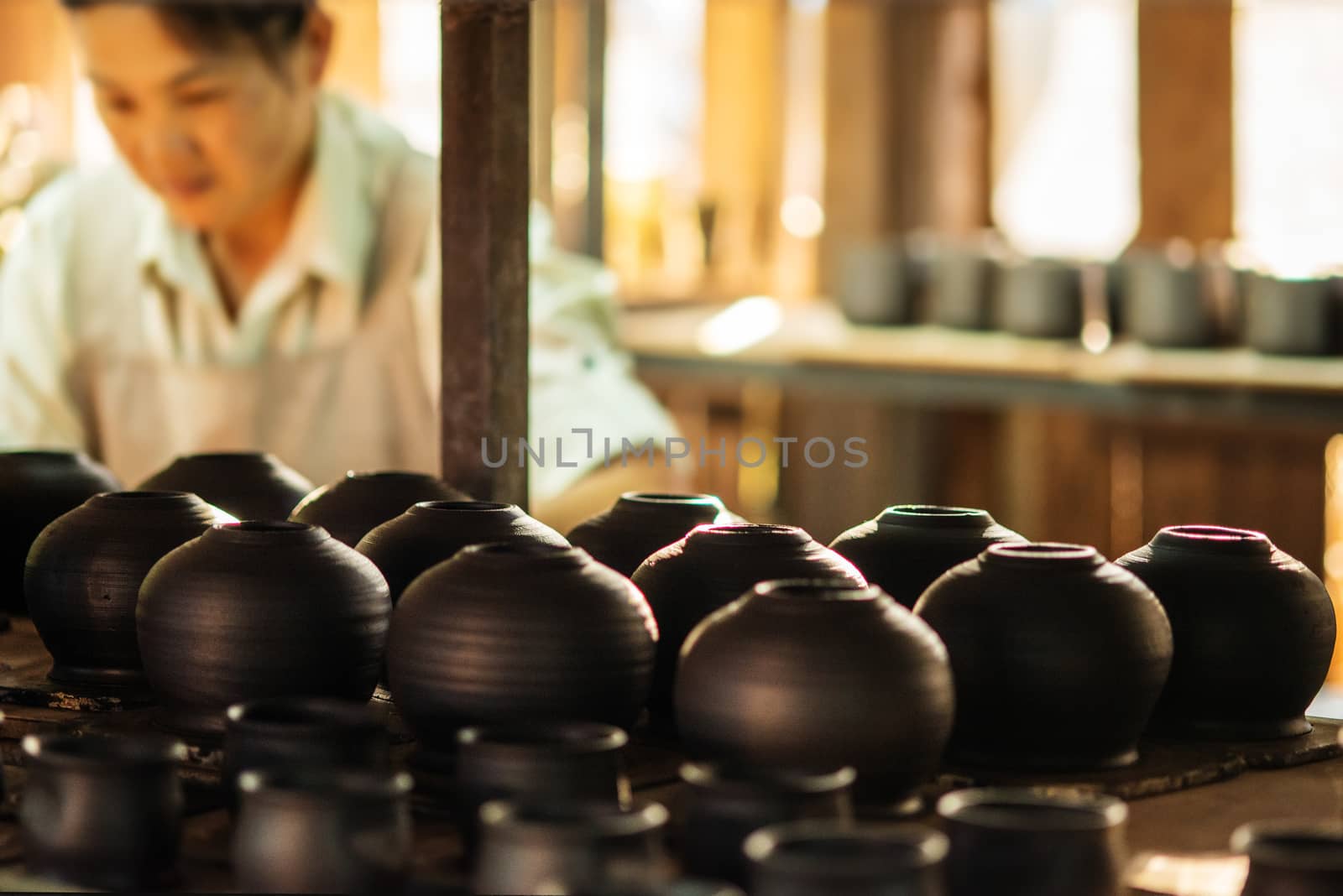 There are many clay pots in the workshop by Yuri2012