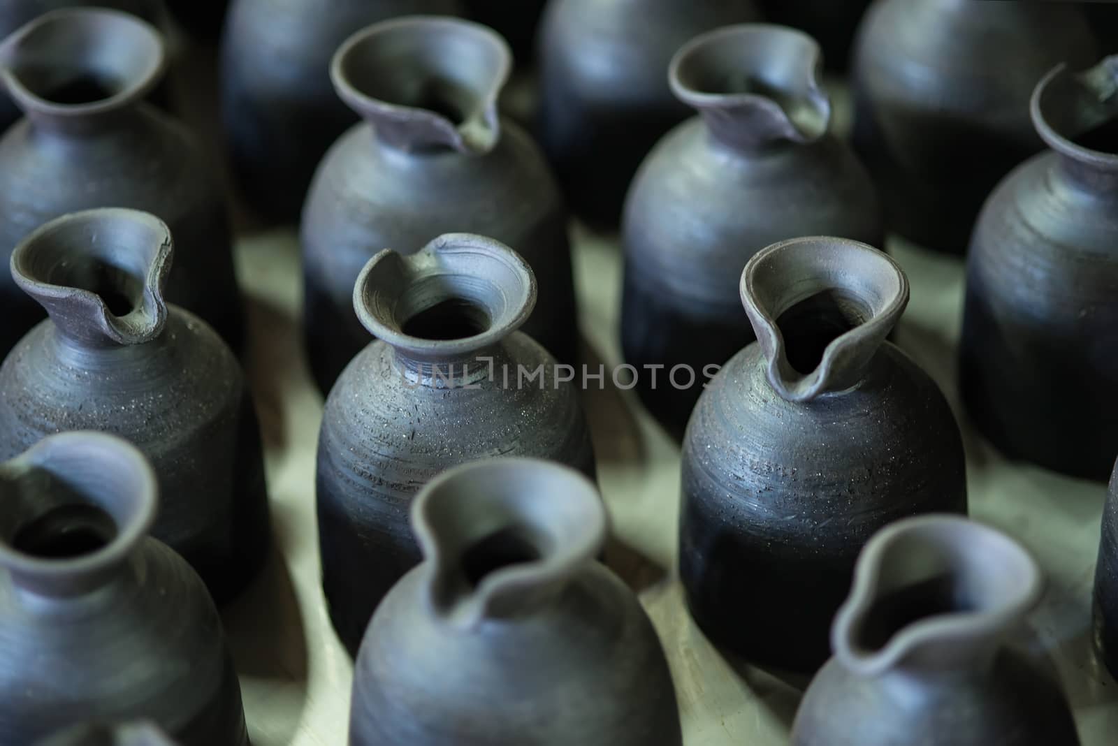 There are many clay pots in the workshop by Yuri2012