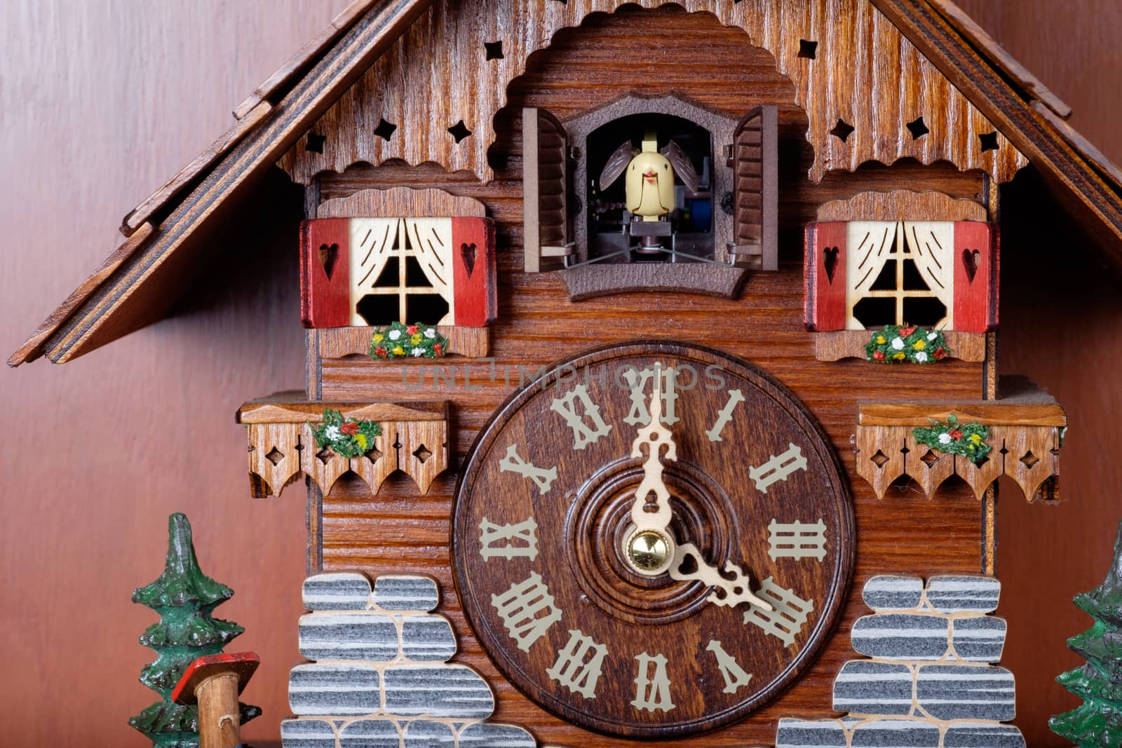 Cuckoo clock with birdie out of house made by crafted wooden