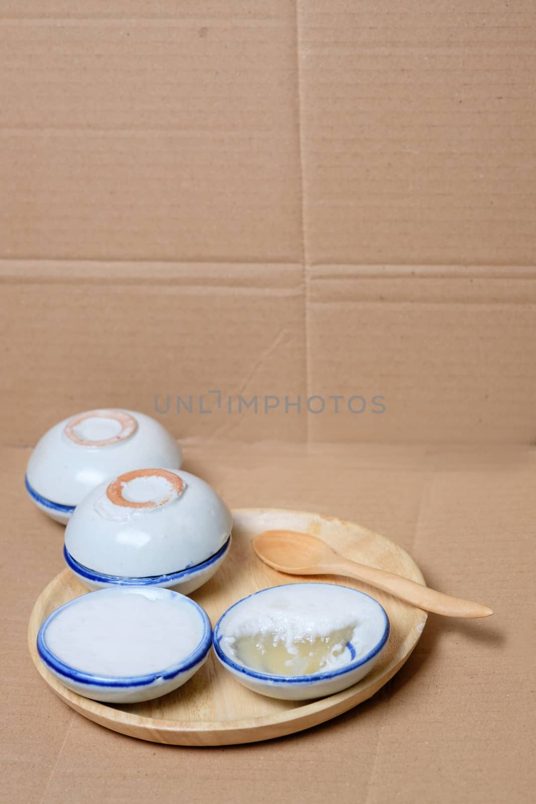 coconut milk custard in small porcelain cup (Thai dessert).