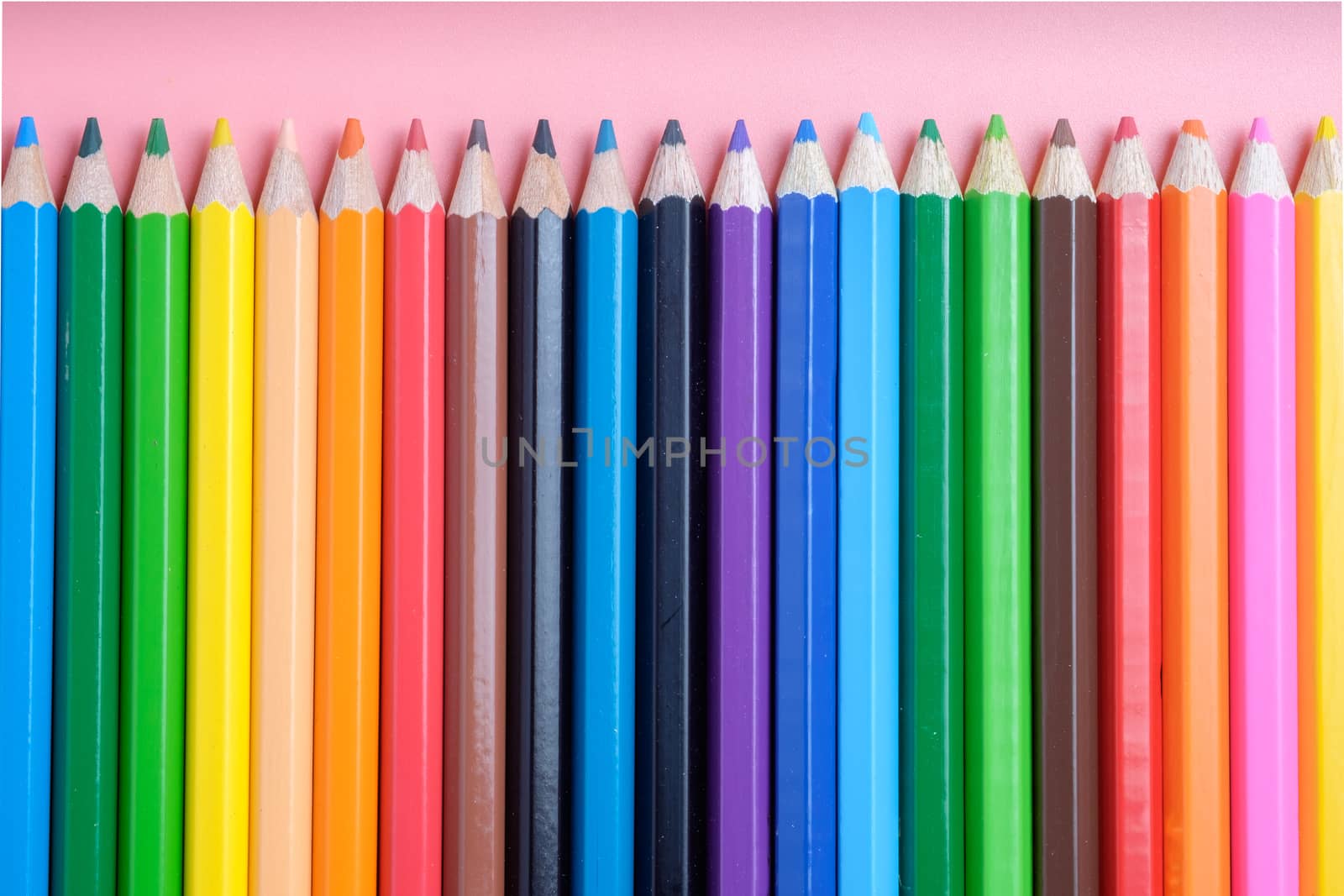 Colored pencils on pink background by zneb076