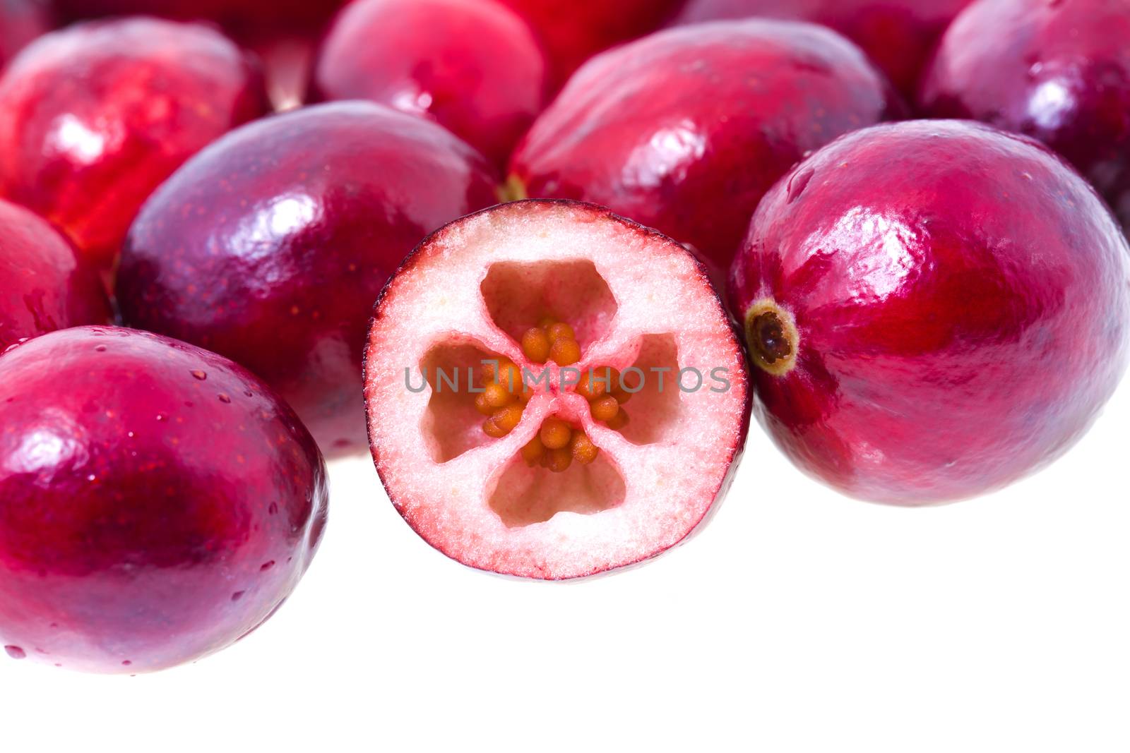 red ripe cranberries, isolated on white background