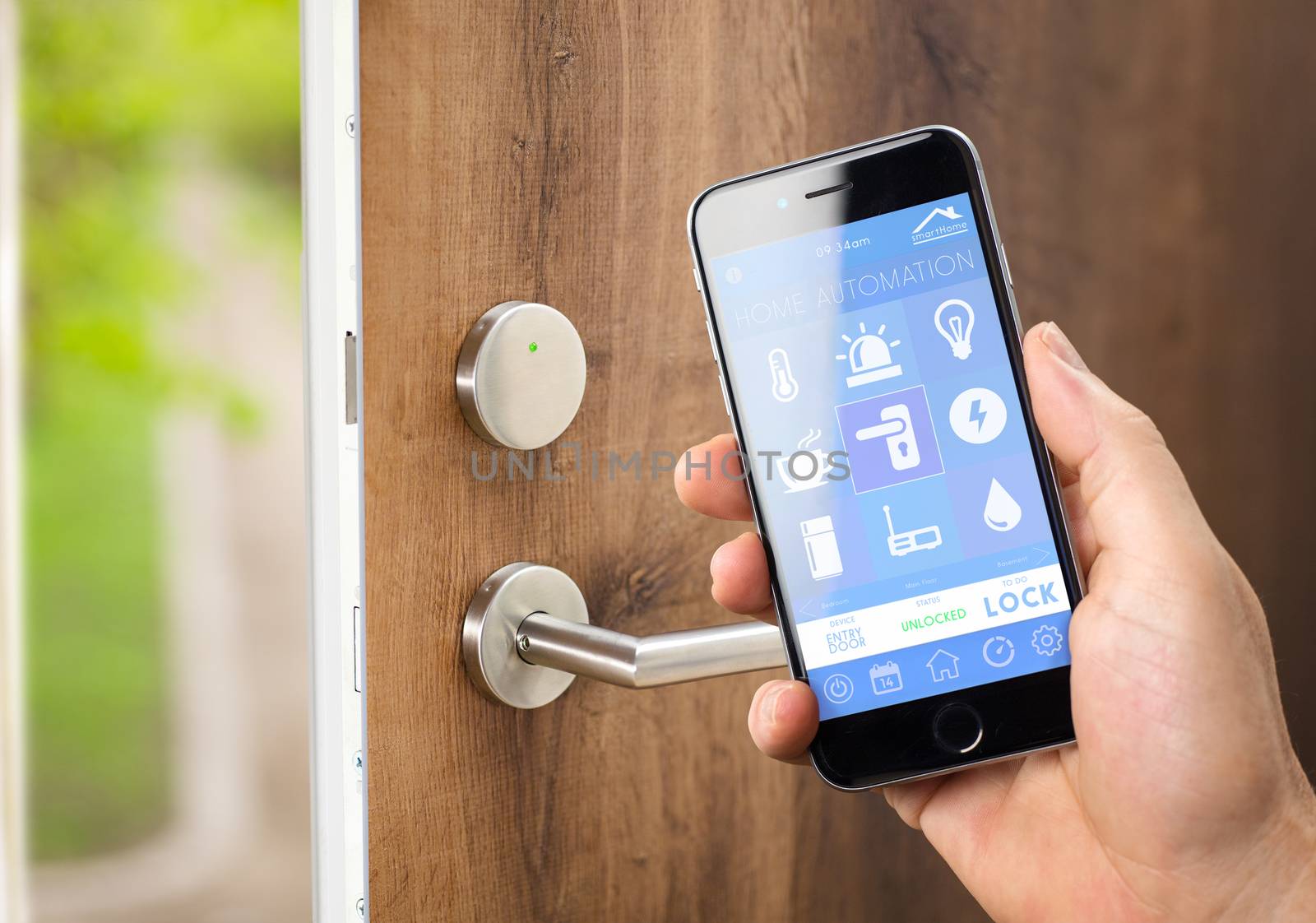 smart house, home automation, device with app icons. Man uses his smartphone with smarthome security app to unlock the door of his house.