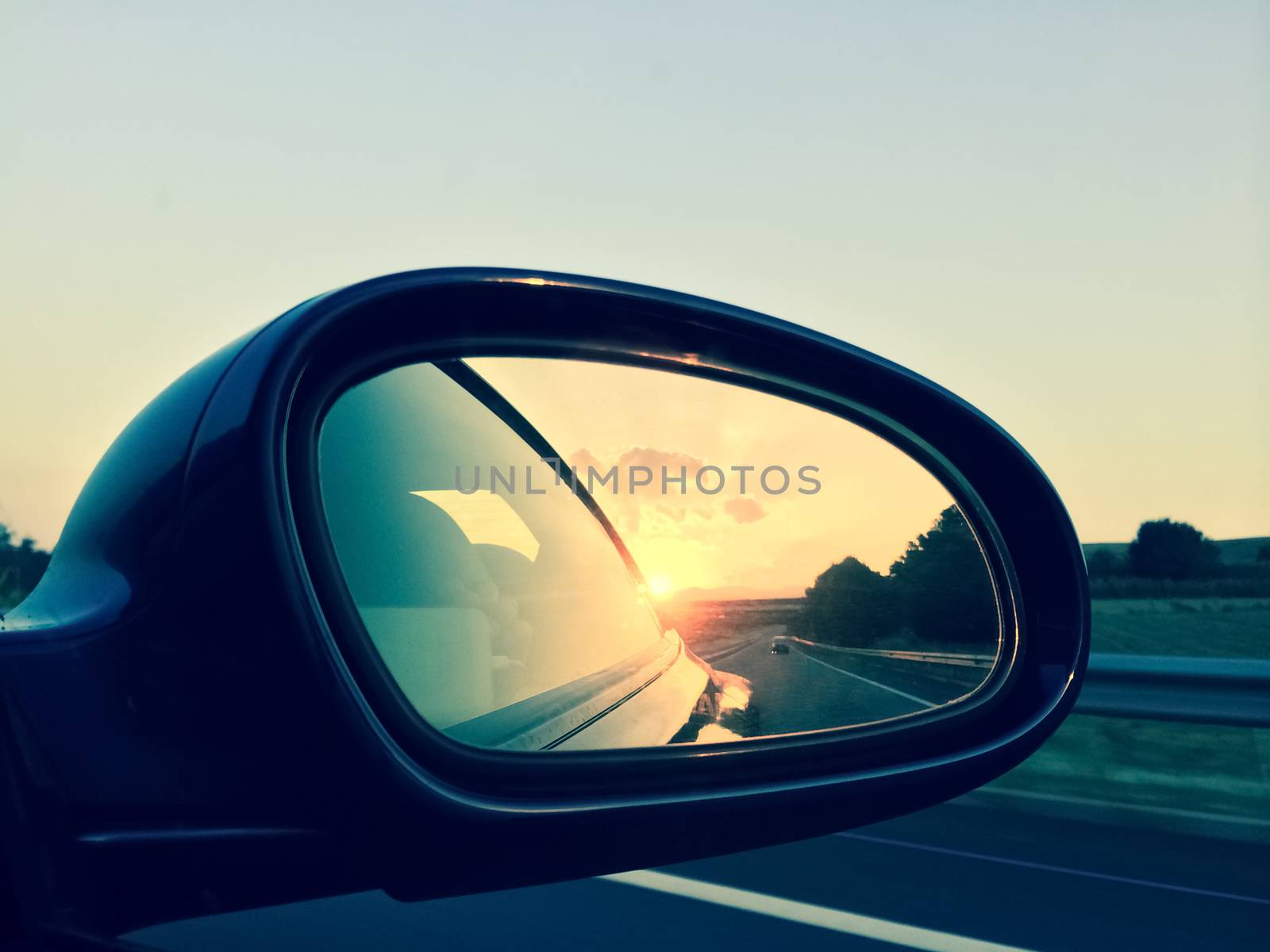 Sunset in a rear view mirror by anikasalsera