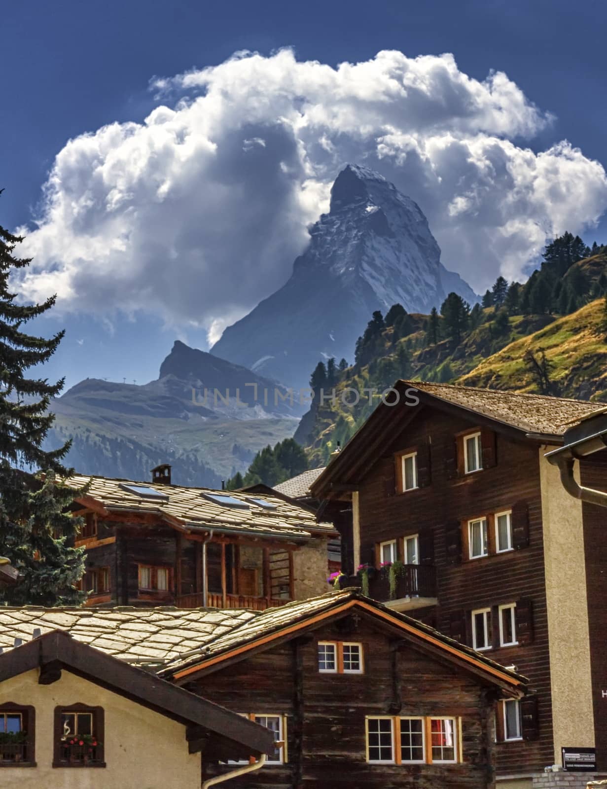 Matterhorn and Zermatt village houses, Switzerland by Elenaphotos21