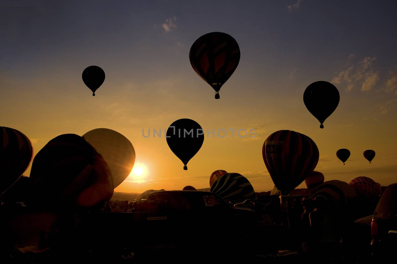 Group balloon launch at a balloon festival. by Balefire9