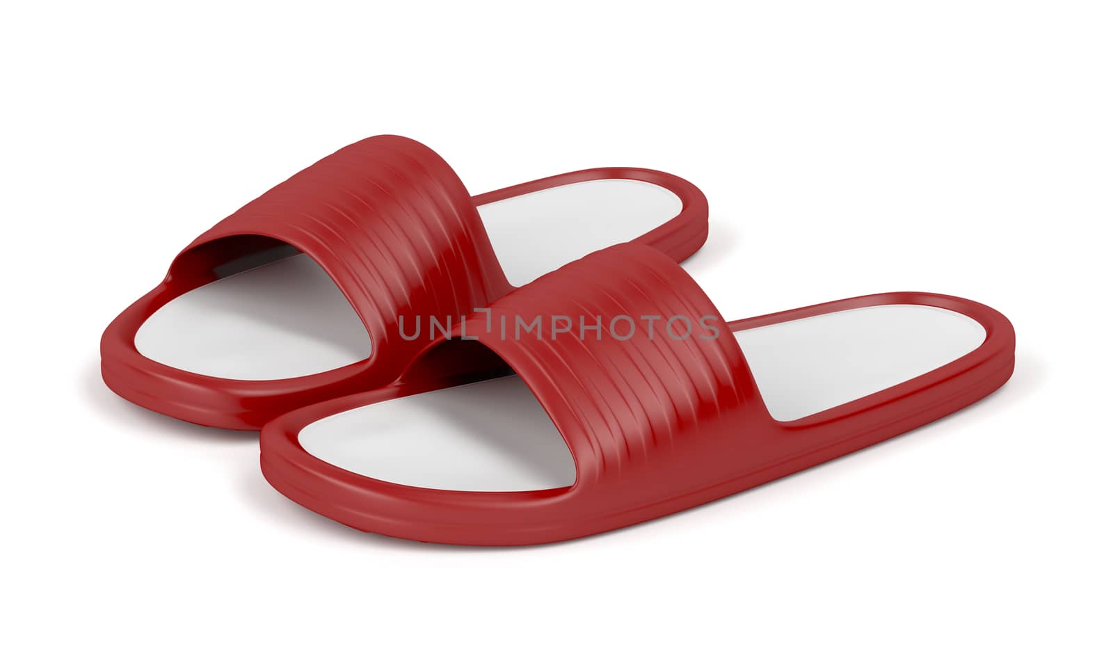 Red rubber slippers on white background