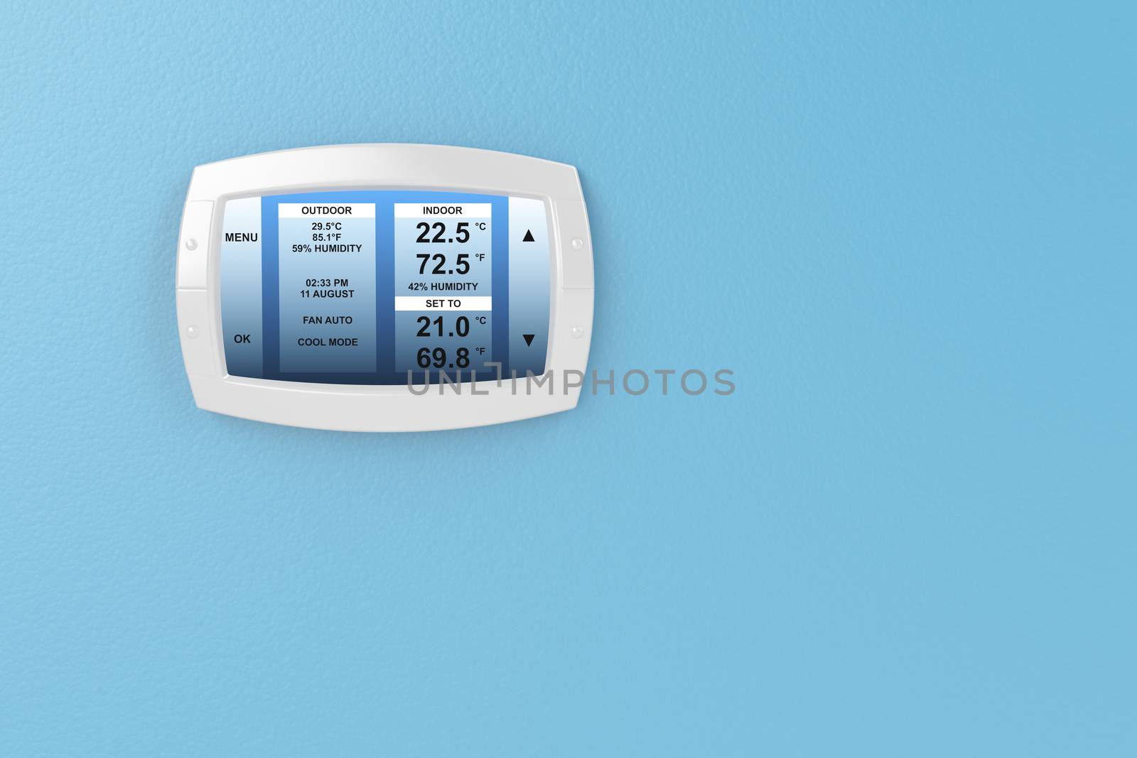 Digital thermostat on blue wall