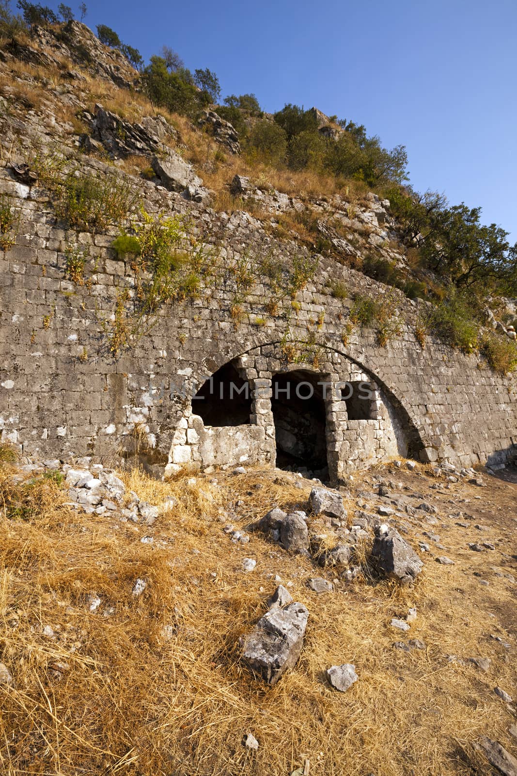   the ruins of the fortress located on the mountain about the city of Kotor, Montenegro