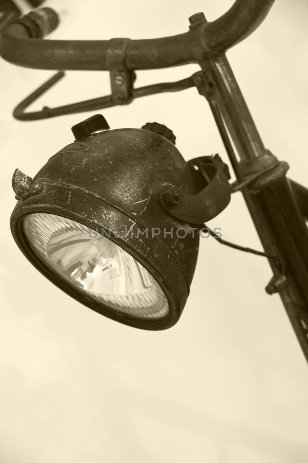 The lamp of an old bike.