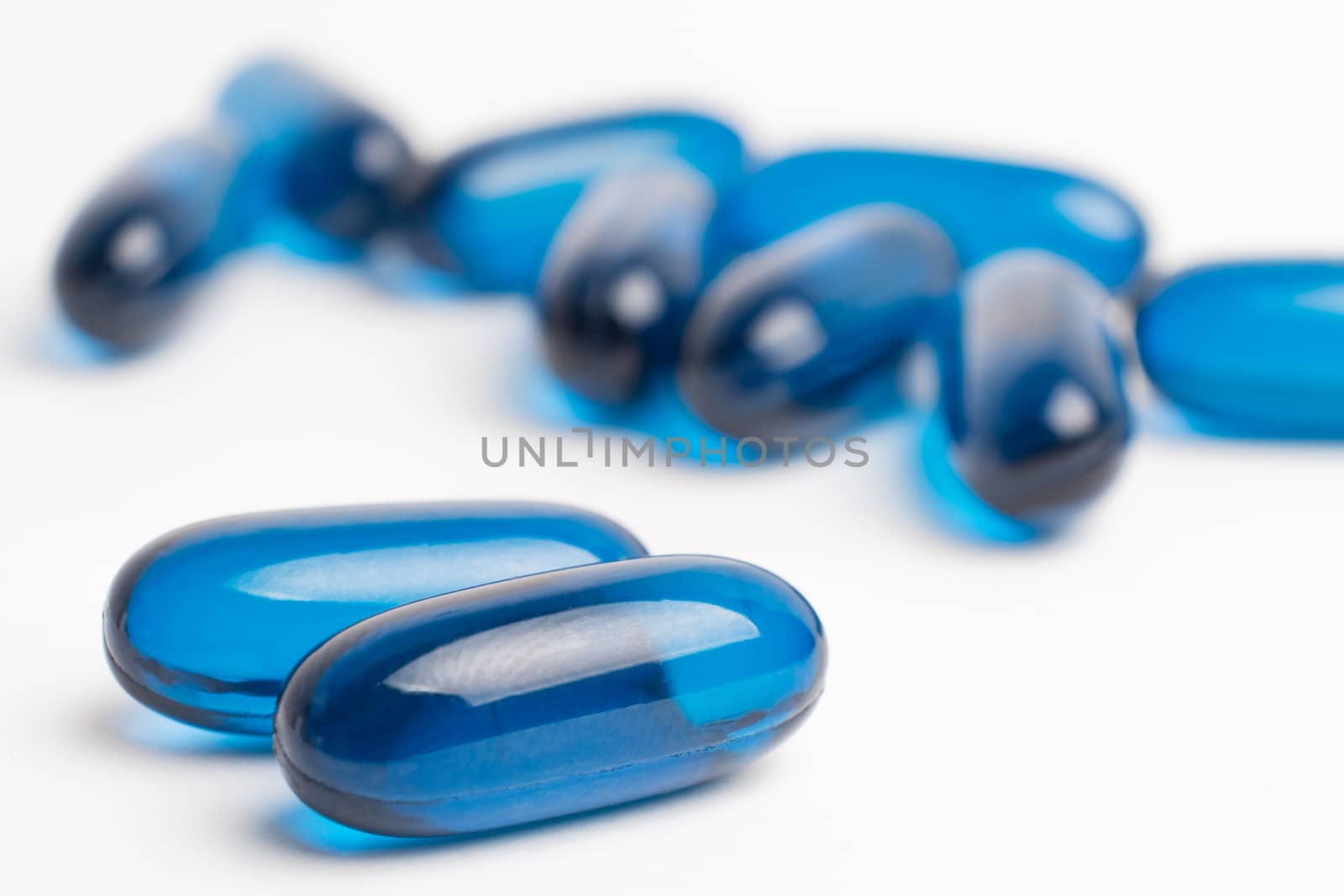 pills of vitamin and medicine on white background