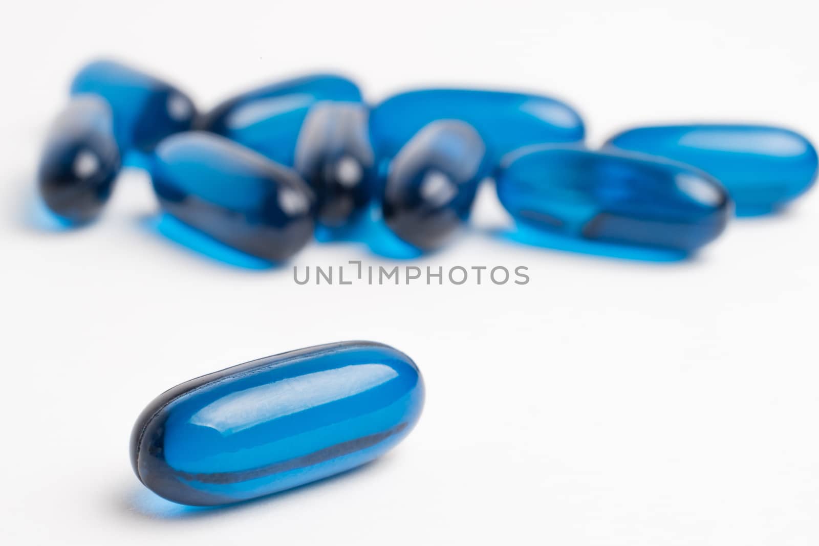 pills of vitamin and medicine on white background