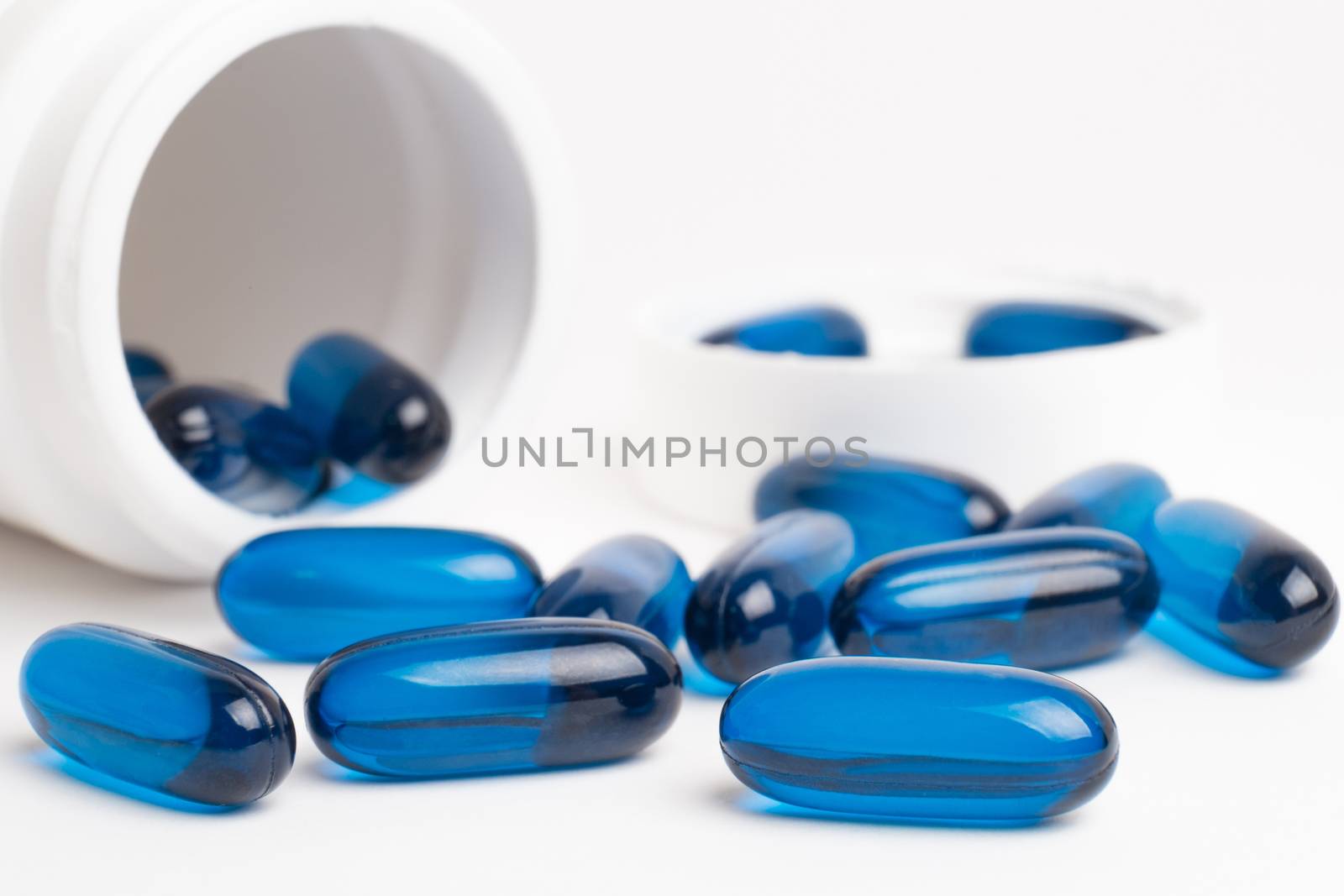 pills of vitamin and medicine on white background