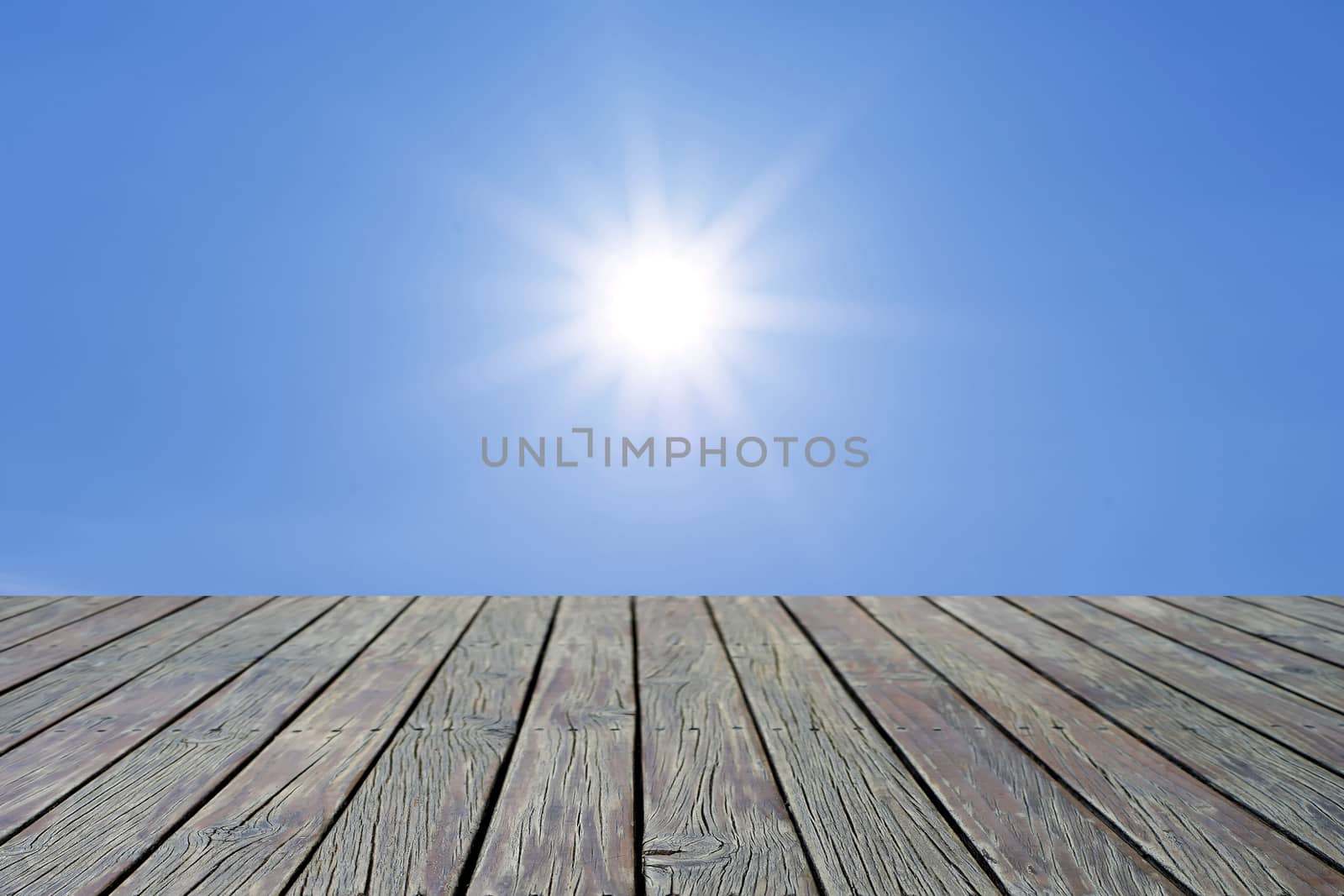 wooden floor with beautiful sunlight on sky
