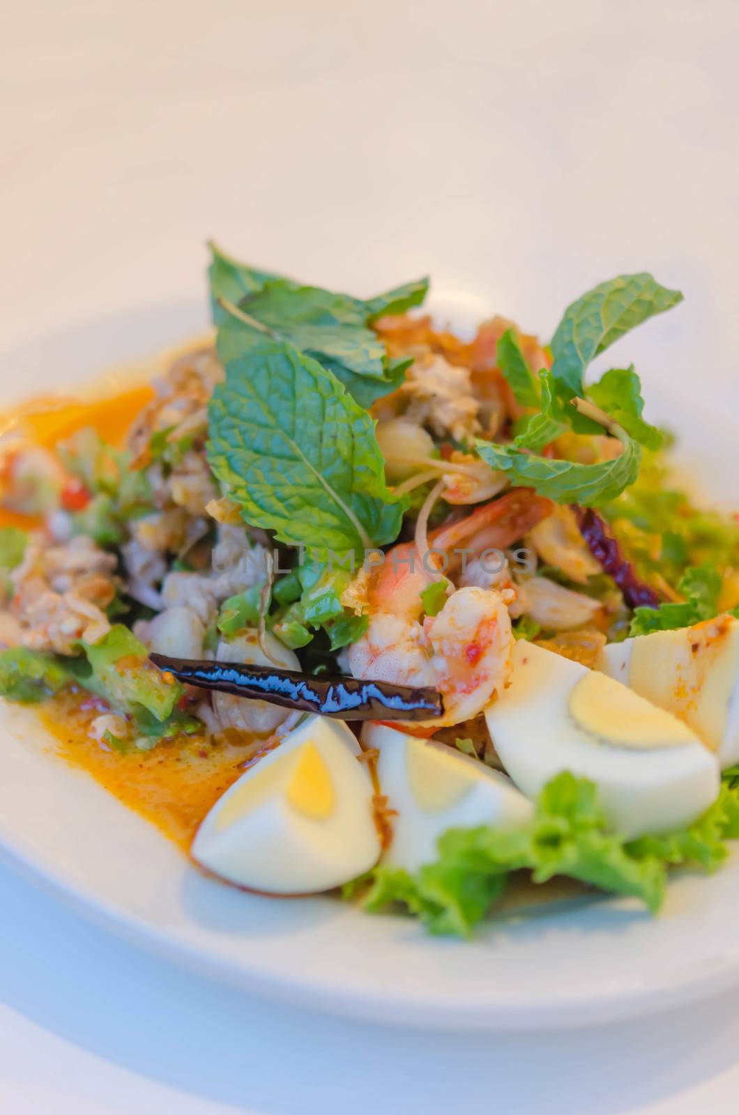 asian spicy salad with shrimp and vegetables