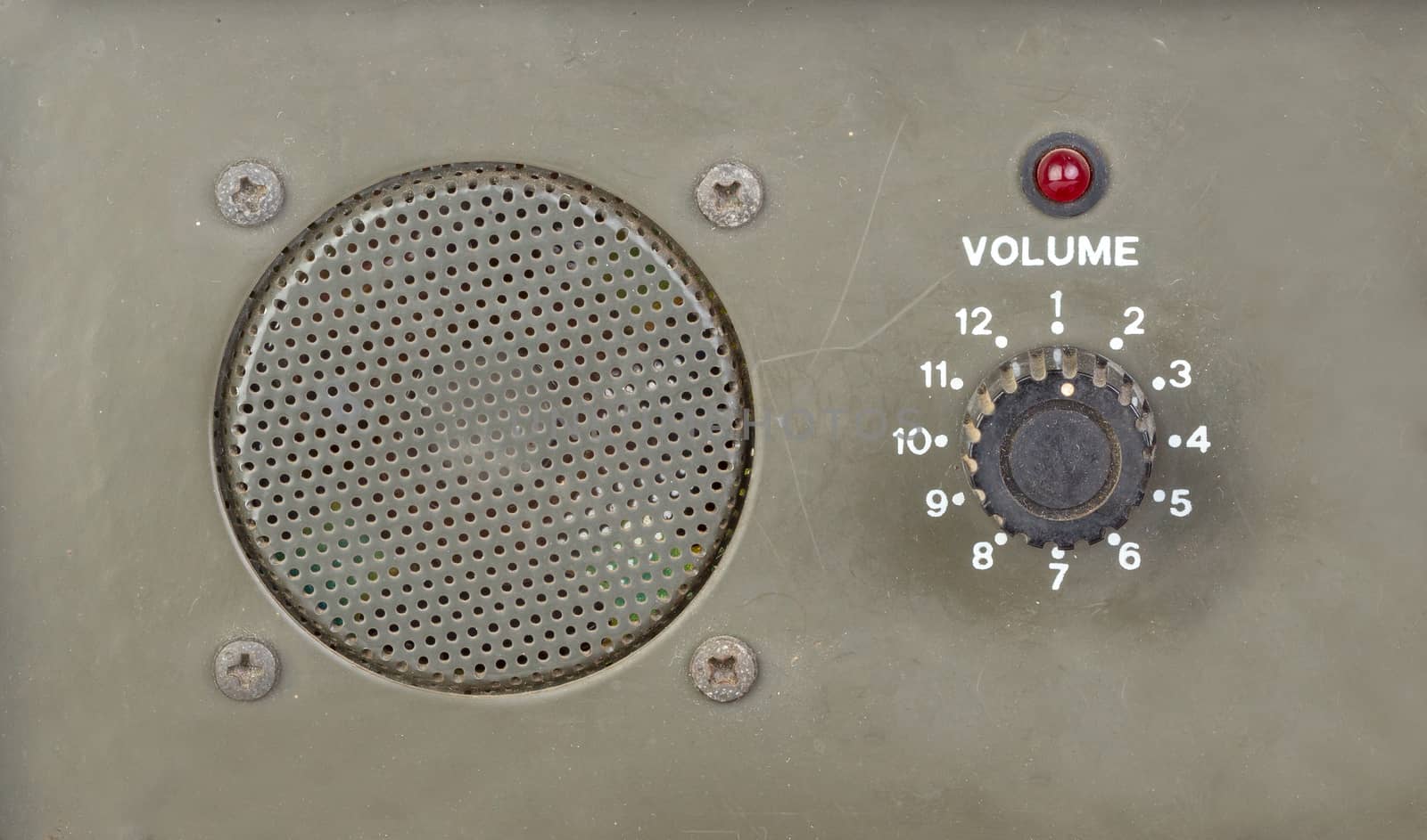 old style dial volume switch with speaker and red light indicator