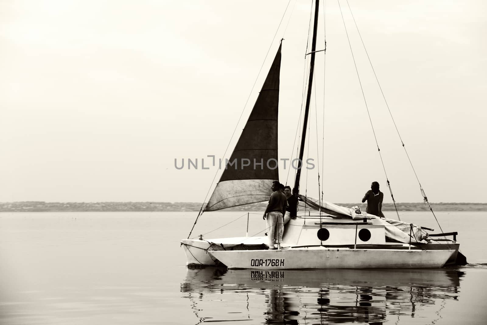 pleasure boat on water  with many peeoples 