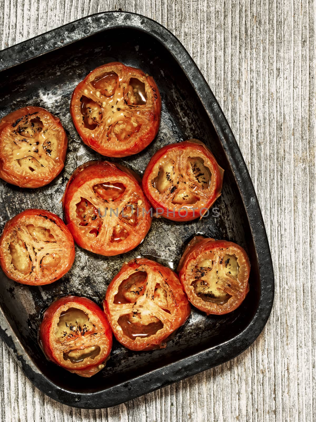 close up of rustic roasted tomatoes