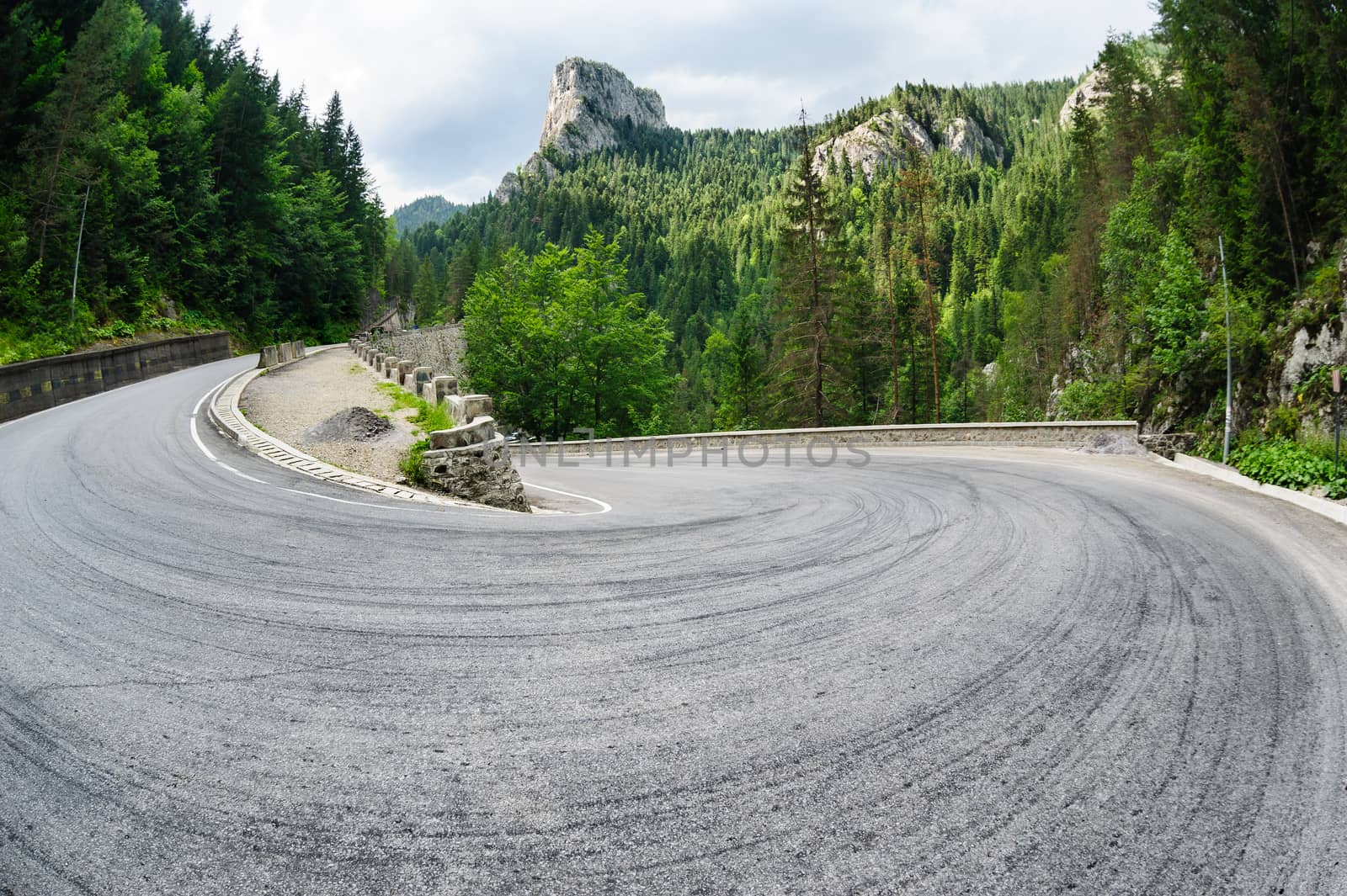 Curved road in Bicaz Canyon one of the most exciting travel road in Romania.