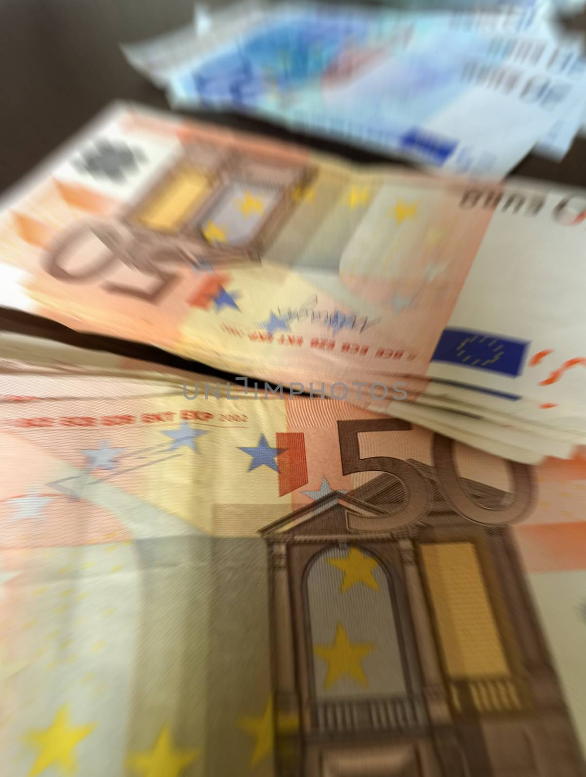 Blurred image of euro money by jovannig