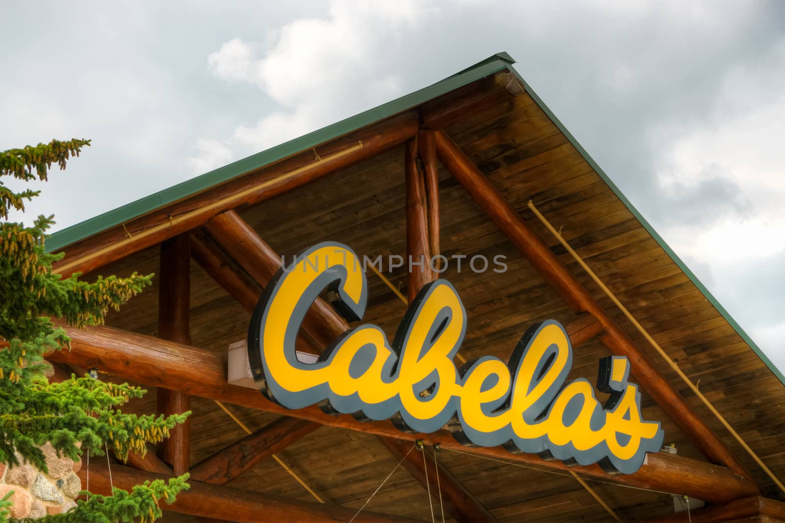 OWATONNA, MN/USA - AUGUST 9, 2015: Cabela's retail exterior. Cabela's retails hunting, fishing, camping, shooting, and related outdoor recreation merchandise.