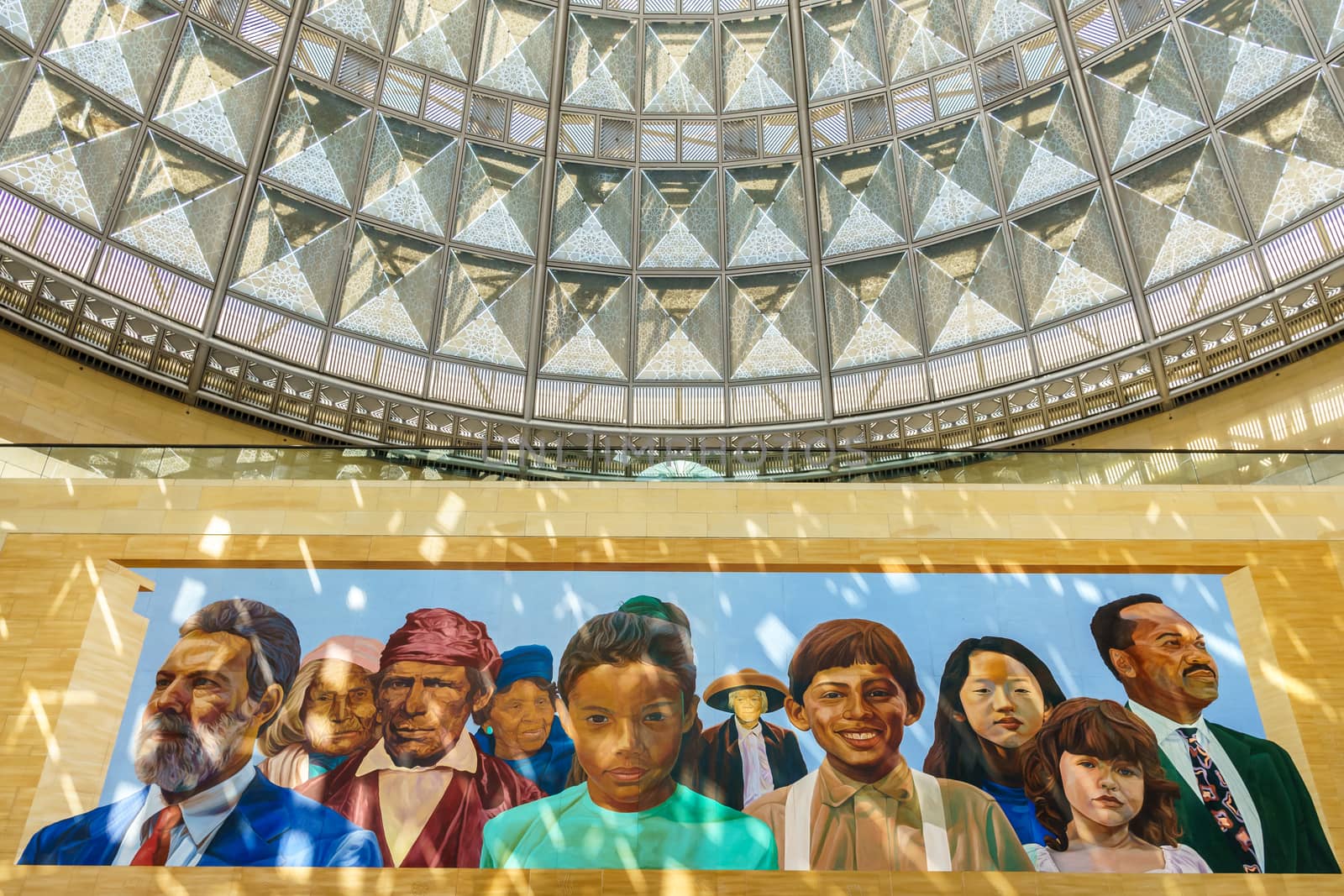 LOS ANGELES, CA/USA - AUGUST 29, 2015: Patsaouras Transit Plaza at Union Station mural of Gabrielino Indians and Latinos by artist Richard Wyatt.