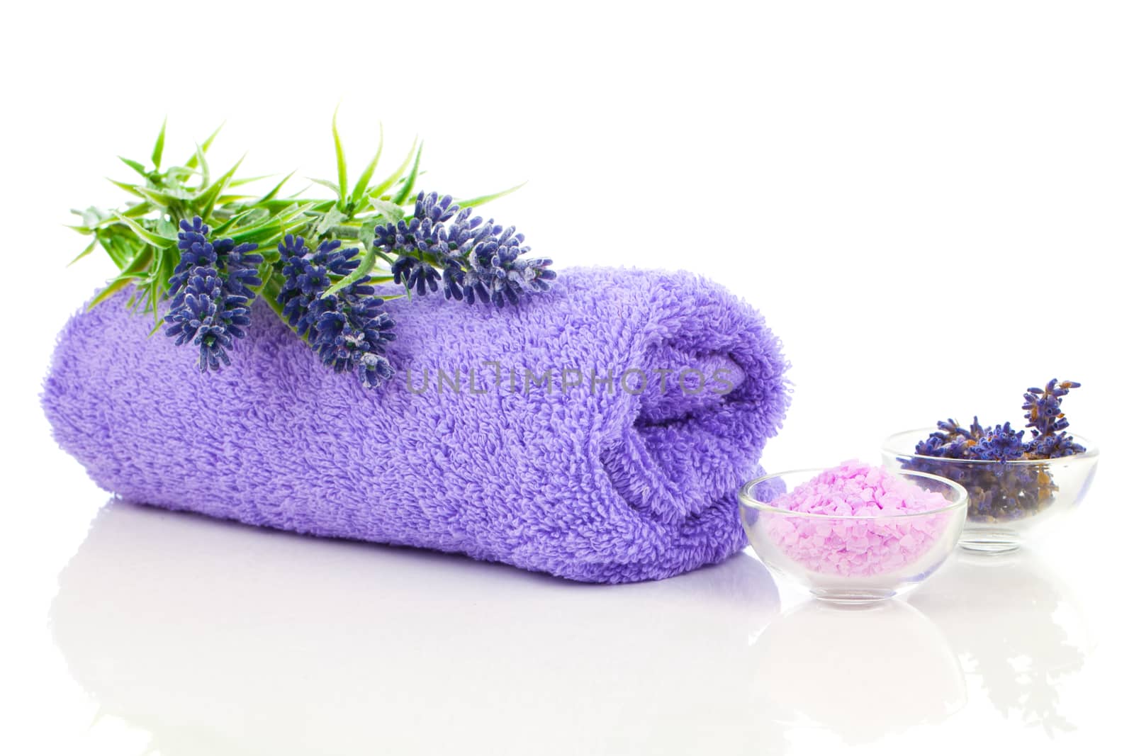 Colorful towel with lavender flower and aromatic bath salt. Isol by motorolka