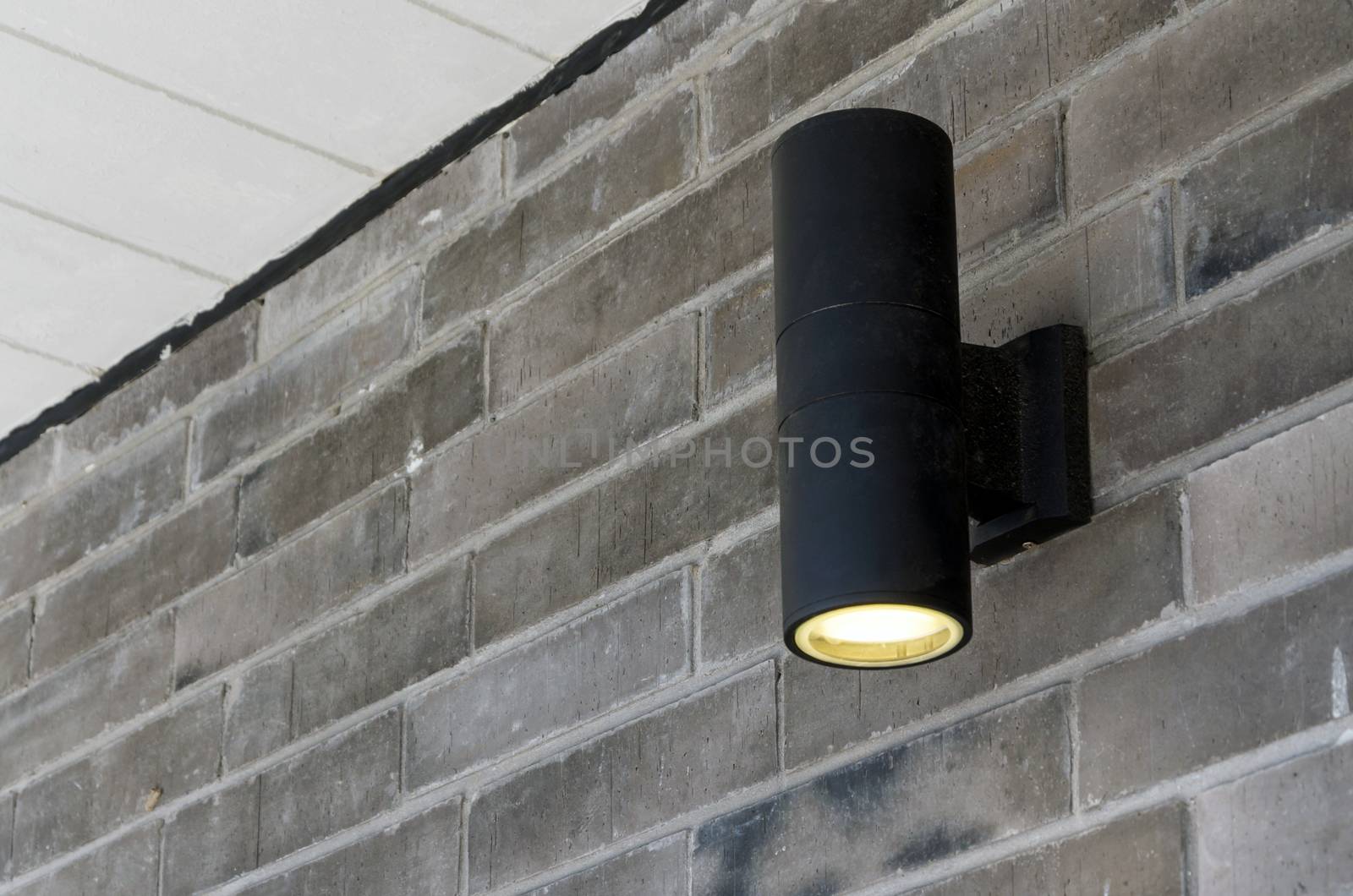 Cylinder wall light on wall 