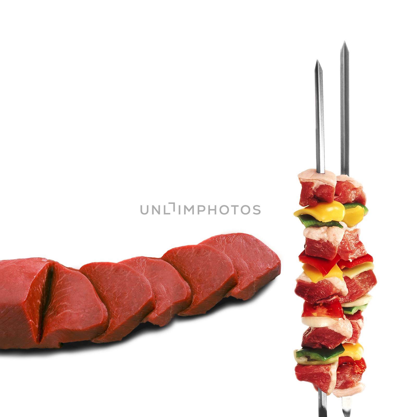 shish kebab on skewers and raw meat by ozaiachin