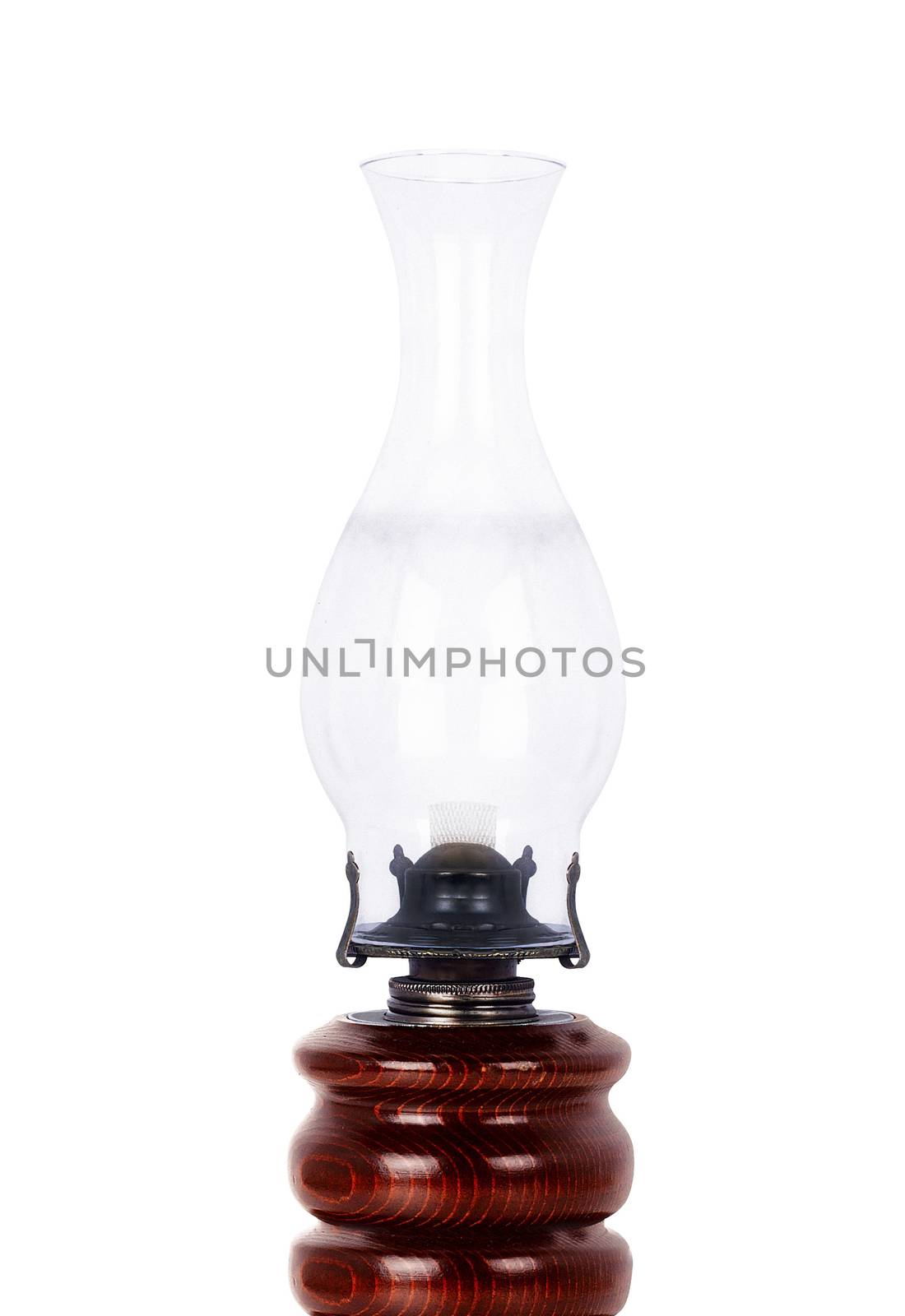 Old dusty oil lamp isolated on white