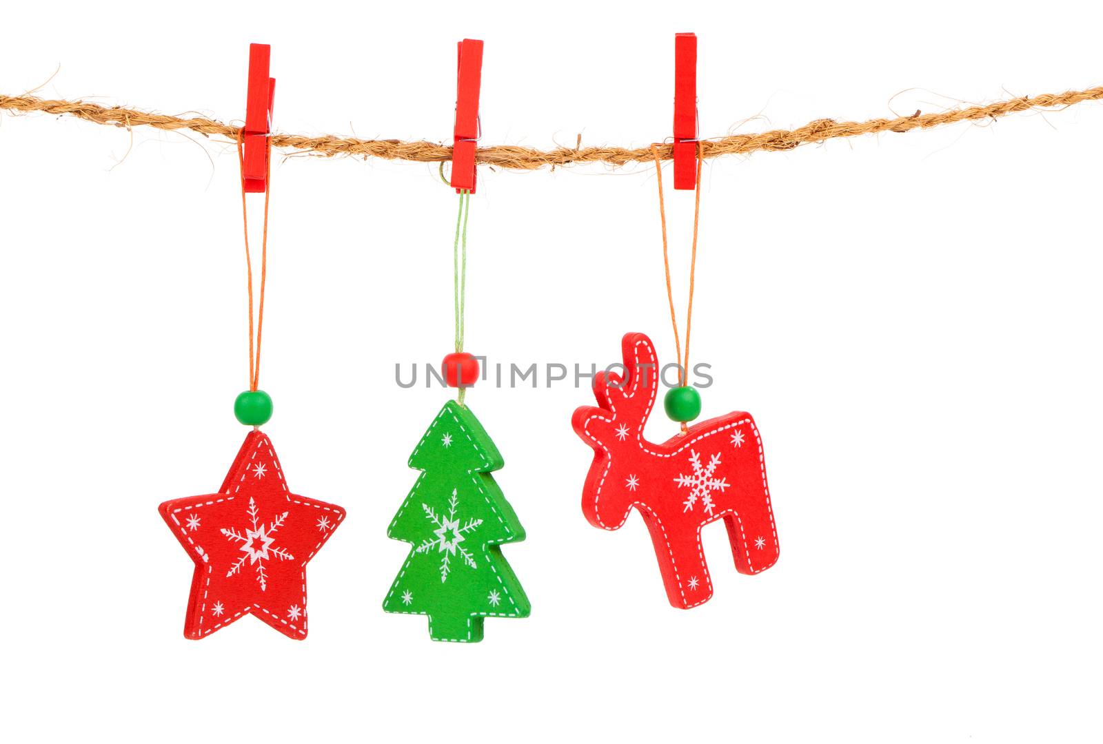 Christmas decorations hanging isolated on white background by motorolka