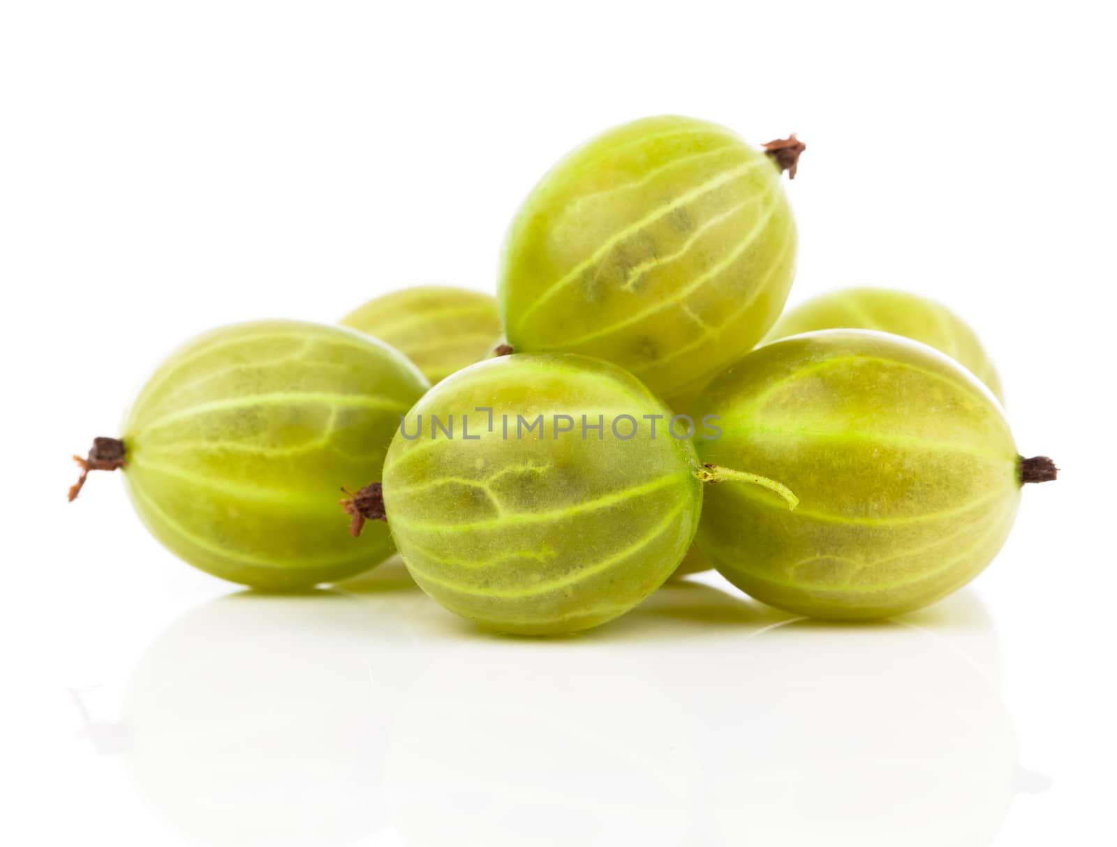 fresh gooseberry isolated on white background by motorolka